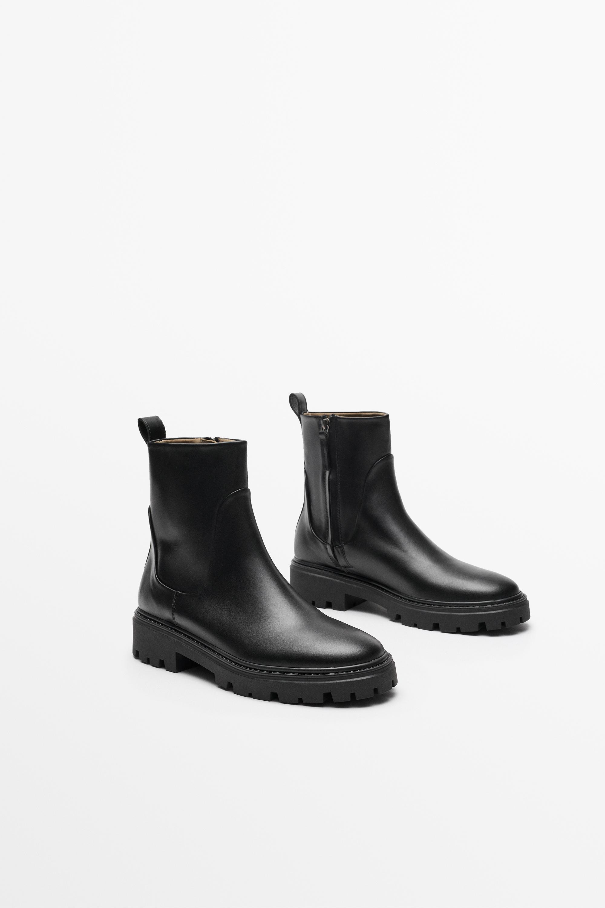 Flat leather ankle boot with track sole