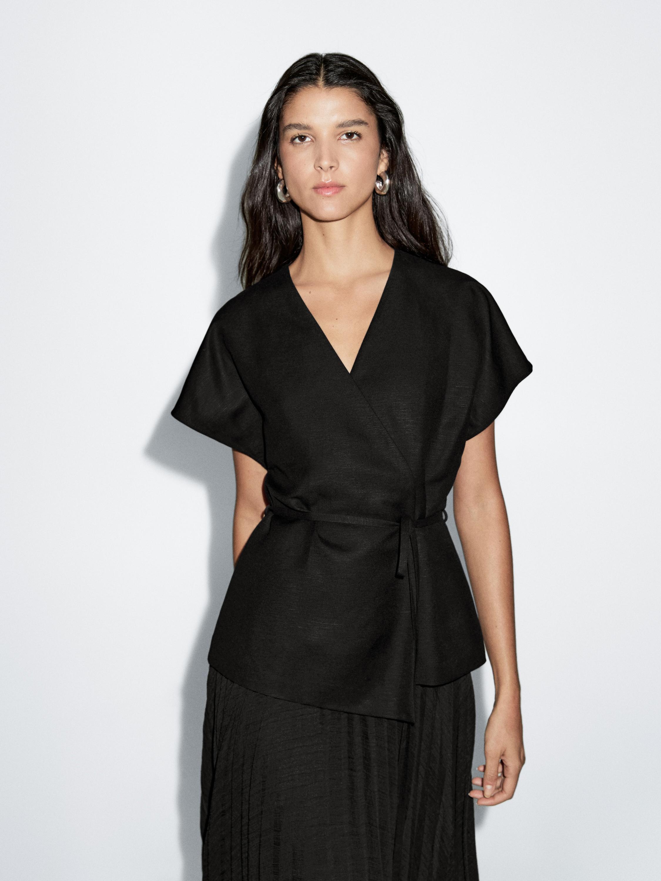 Long pleated dress with waistcoat detail