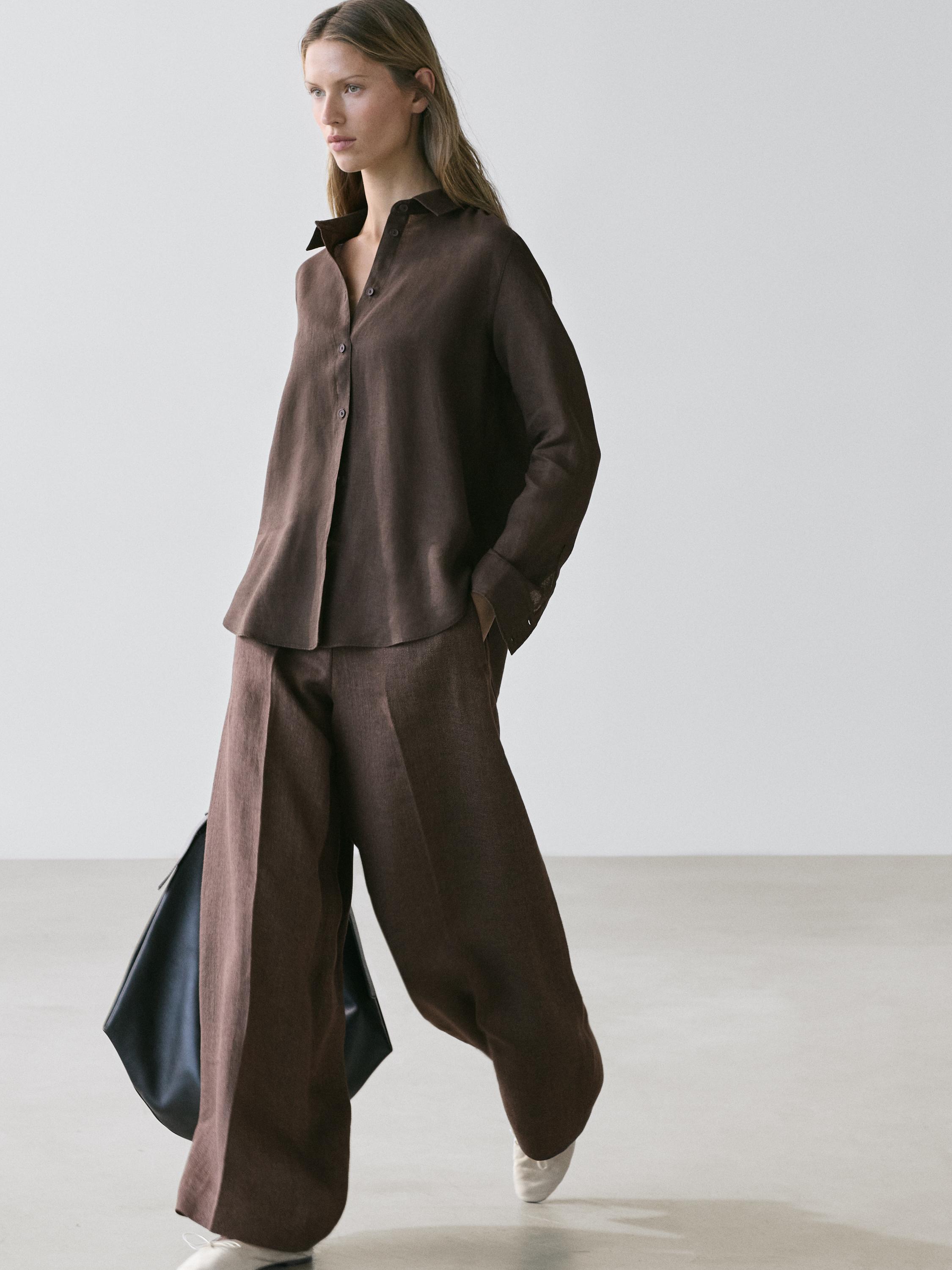 Matching brown long-sleeve button-up shirt and wide-leg pants set.