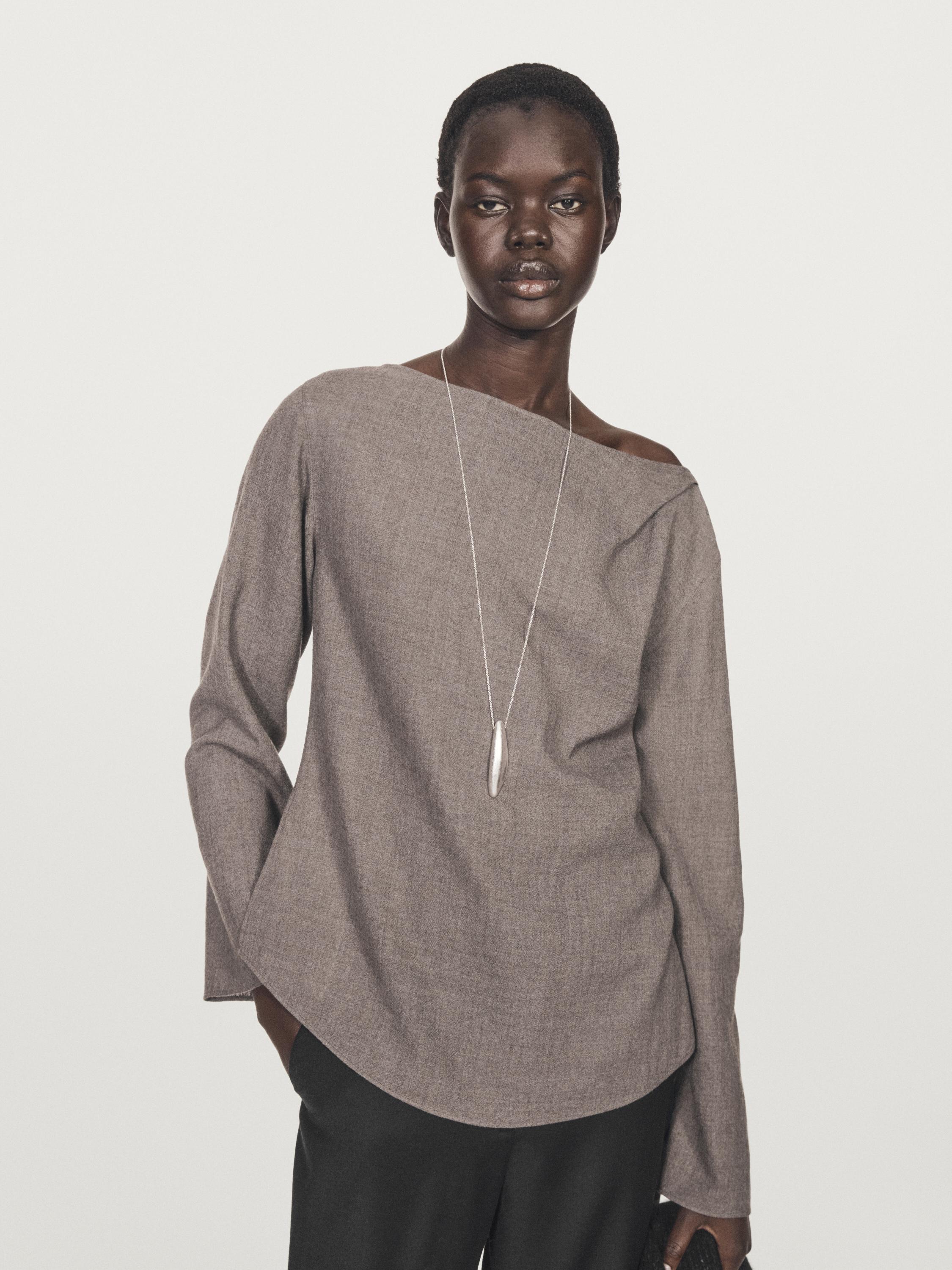 Blusa cuello barco con lana