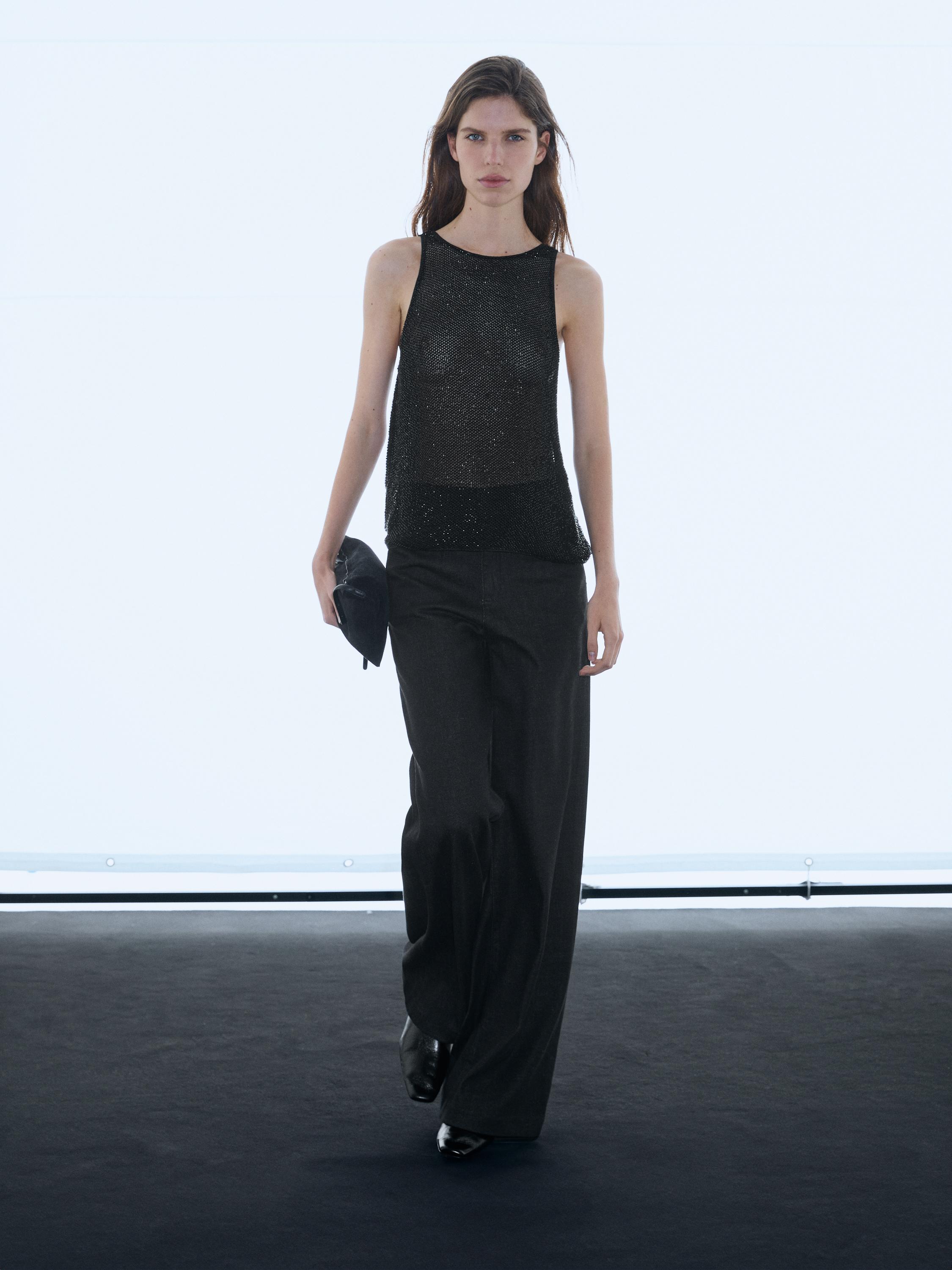 Top semi-transparent à perles fantaisie ton sur ton