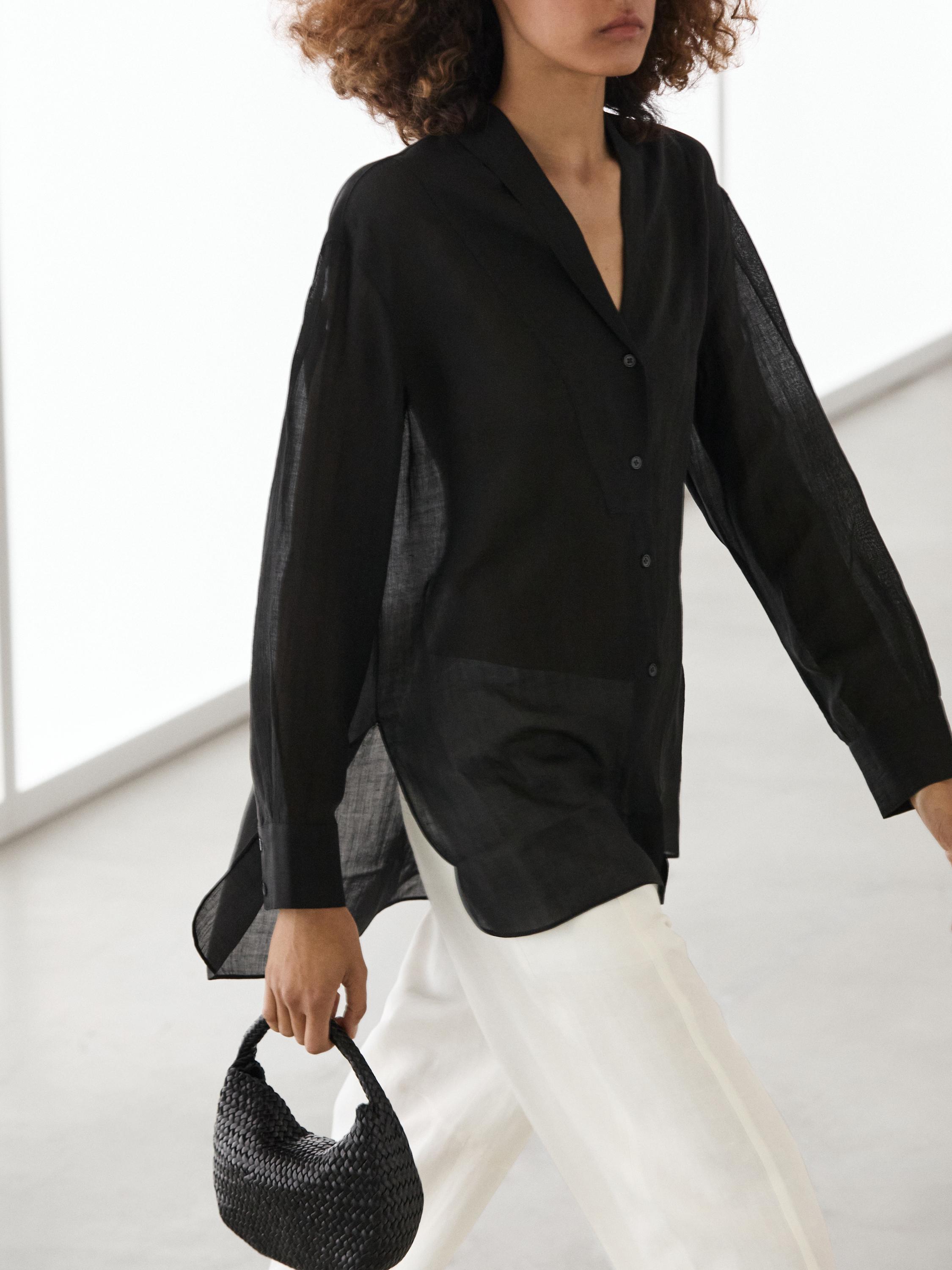 Flowing semi-sheer shirt with chest detail — BLACK