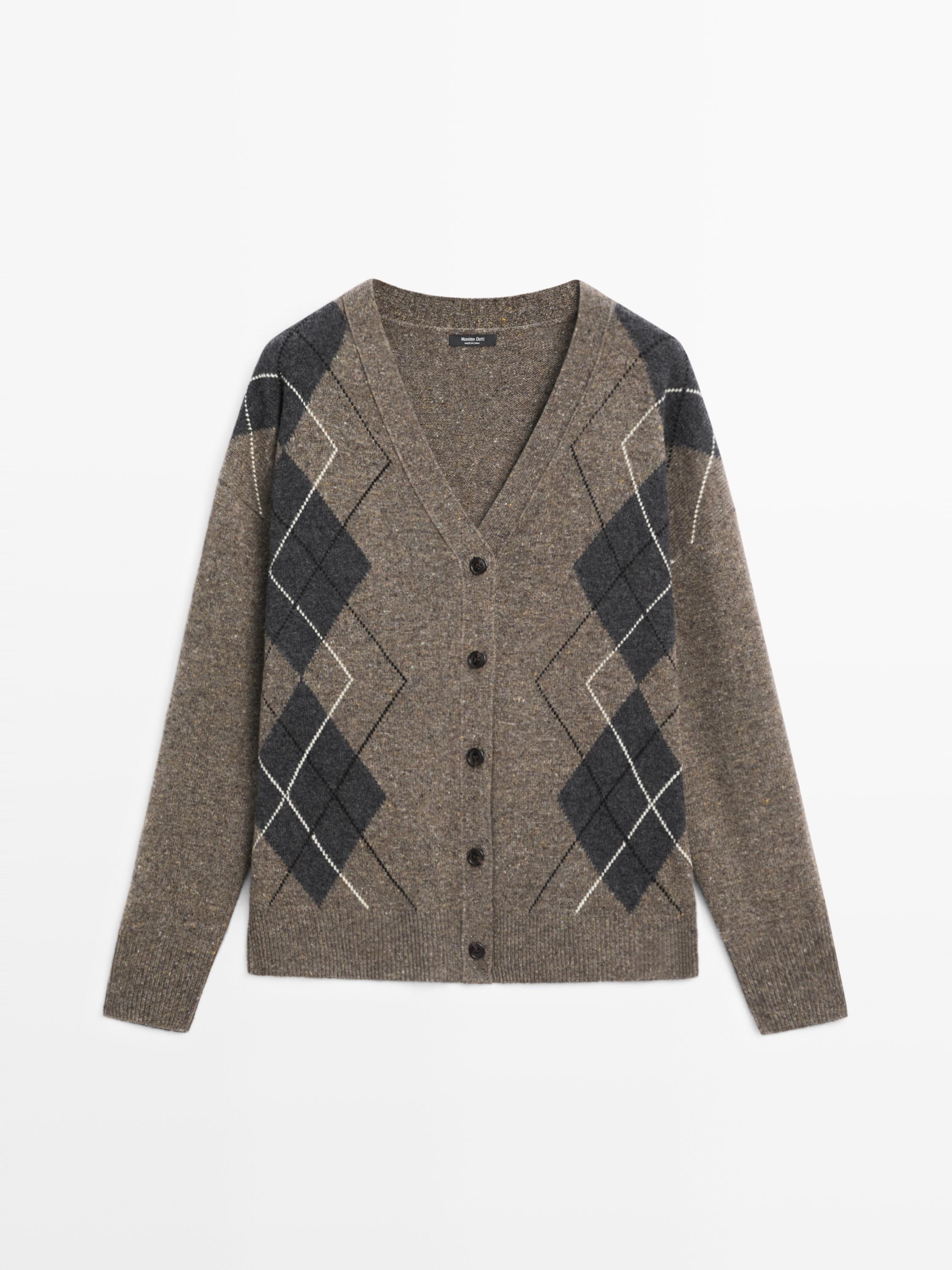 Front view of taupe brown cardigan with argyle pattern in gray and black, button closure, and V-neckline.