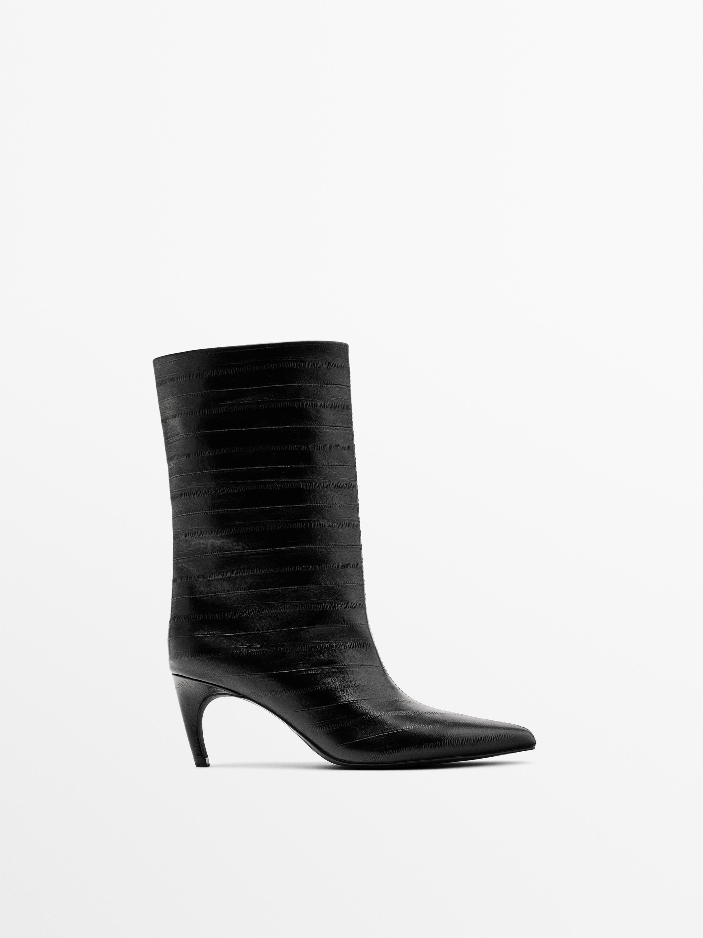 Botín tacón piel grabada