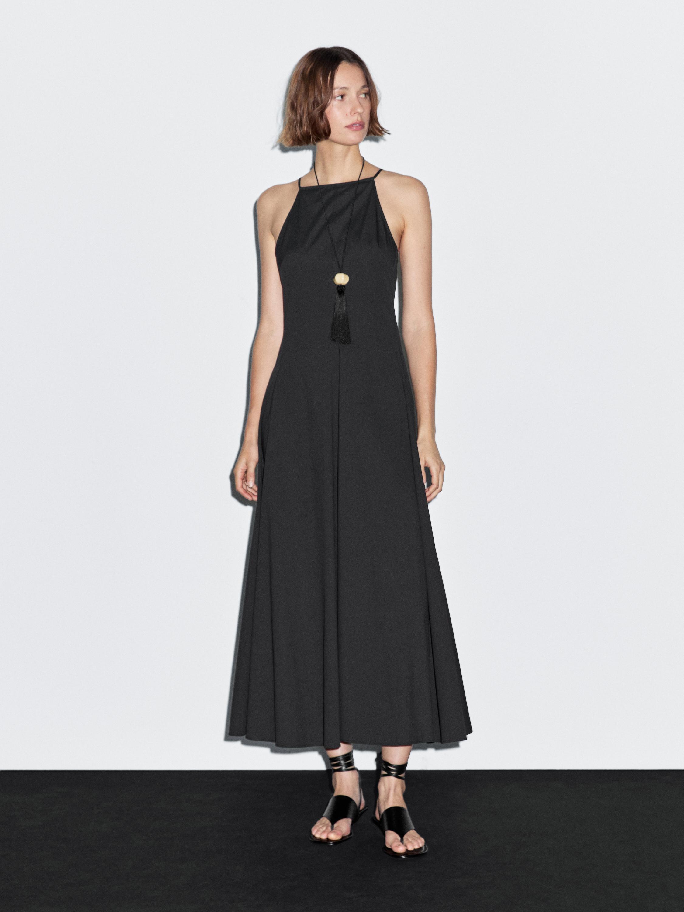 Long halter neck dress with flounce
