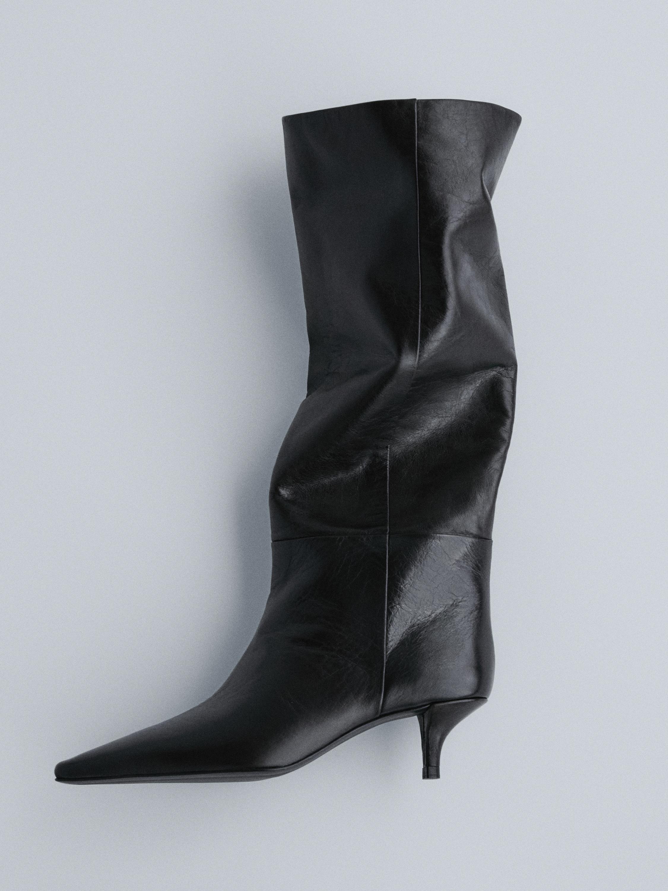 Heeled leather boots