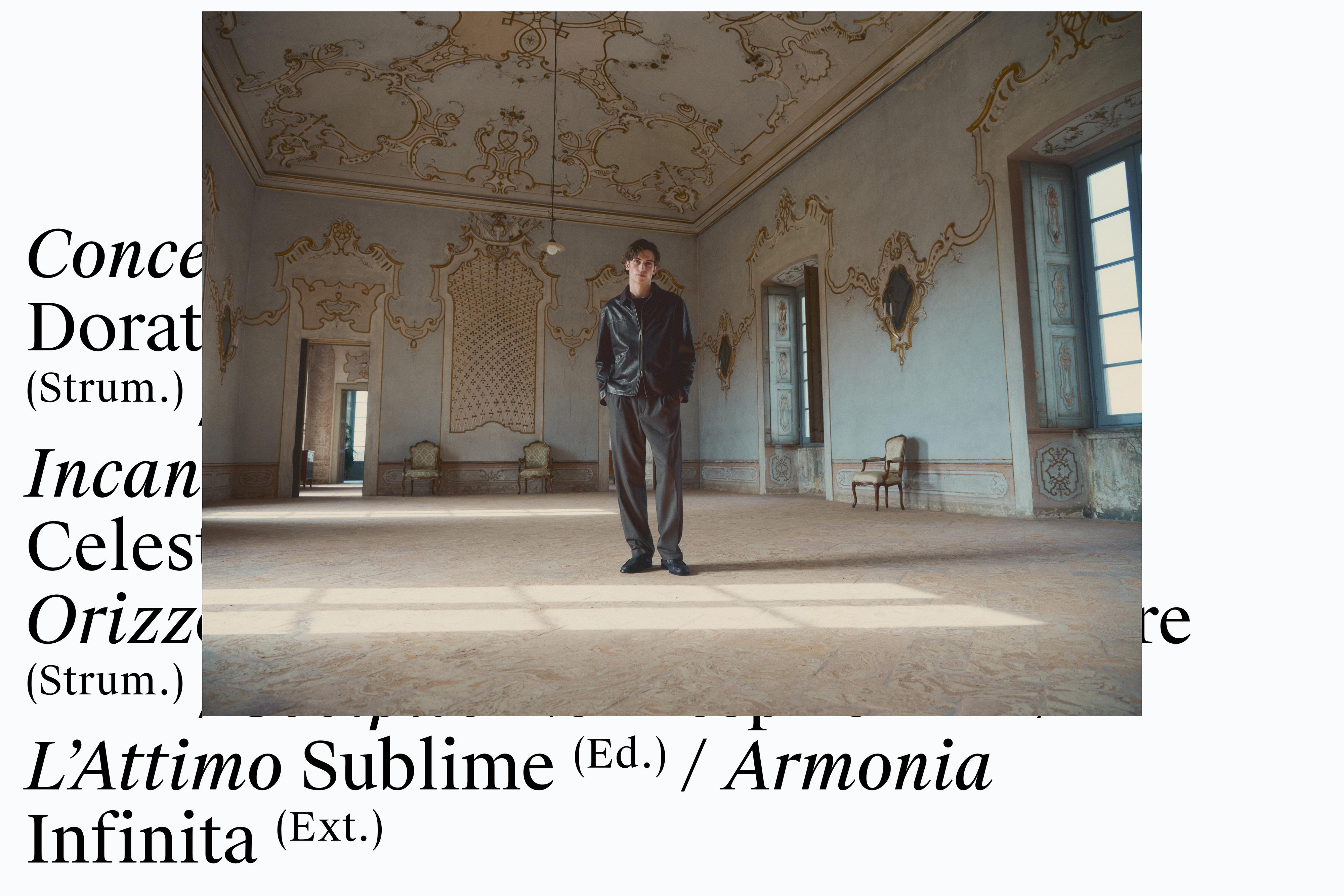 Chaqueta beltza eta praka grisak.