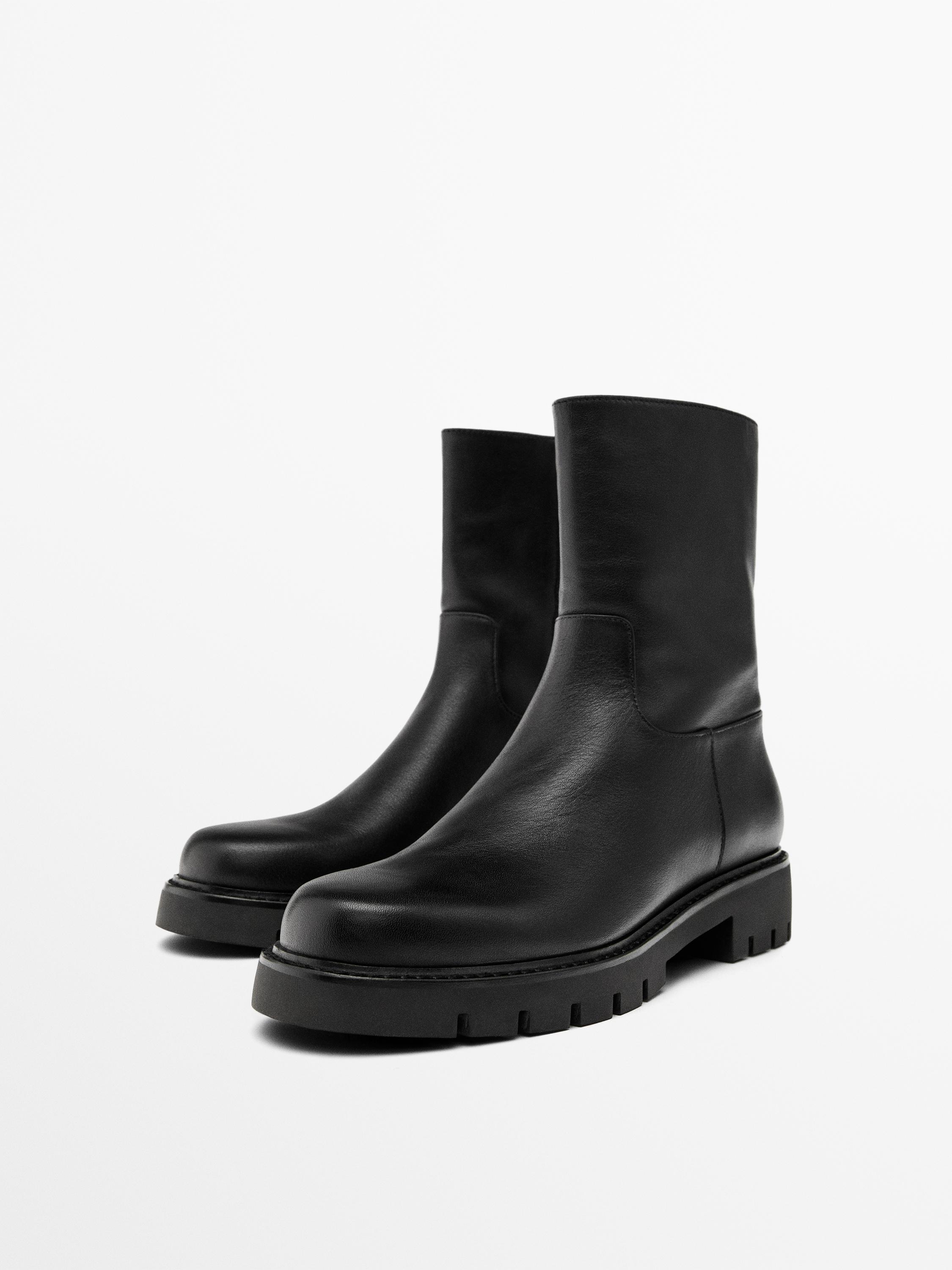 Track sole flat ankle boots