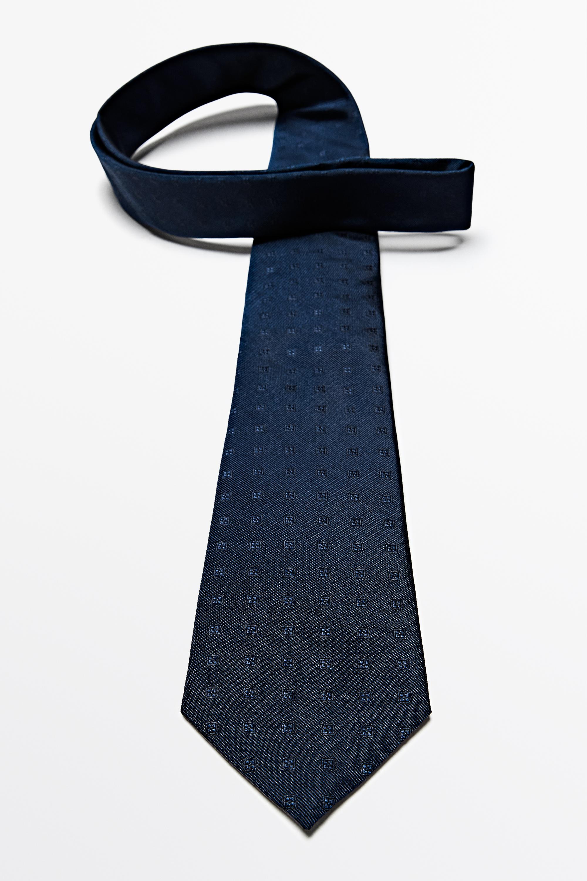 100% silk tie with embroidered detail — NAVY BLUE