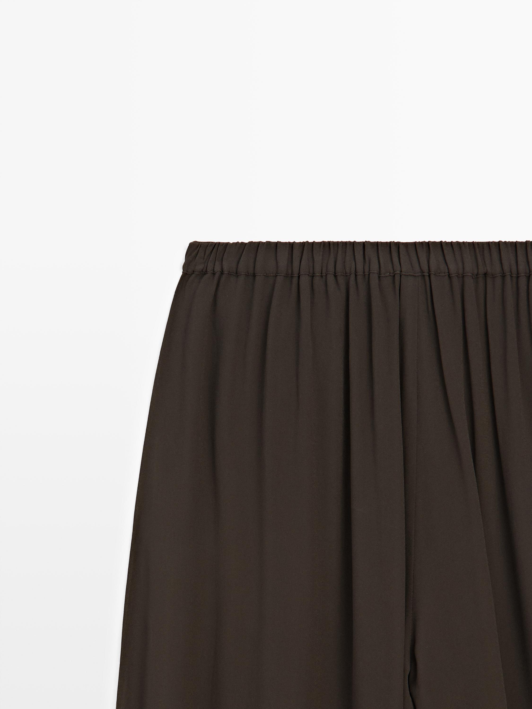 Semi-sheer sarouel trousers with button details — Chocolate