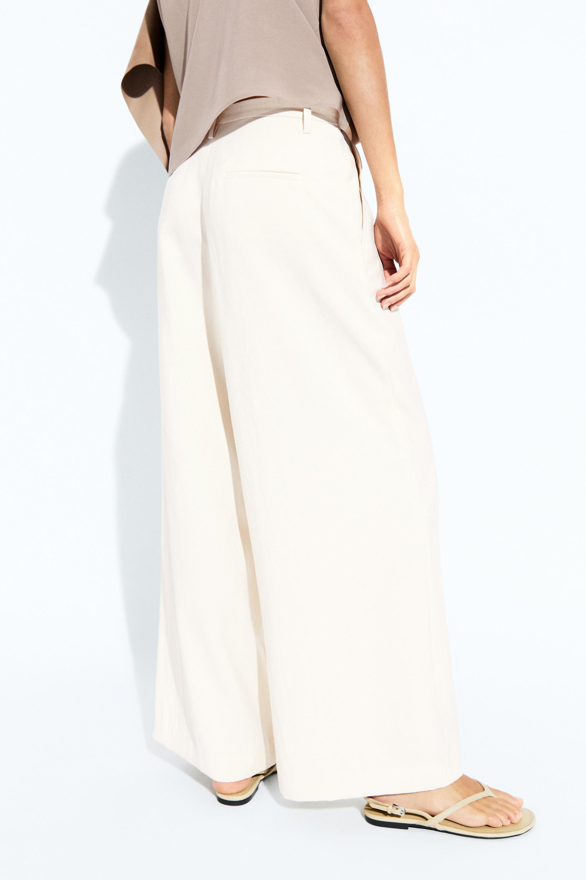 Flowing cropped wide-leg pants — CREAM