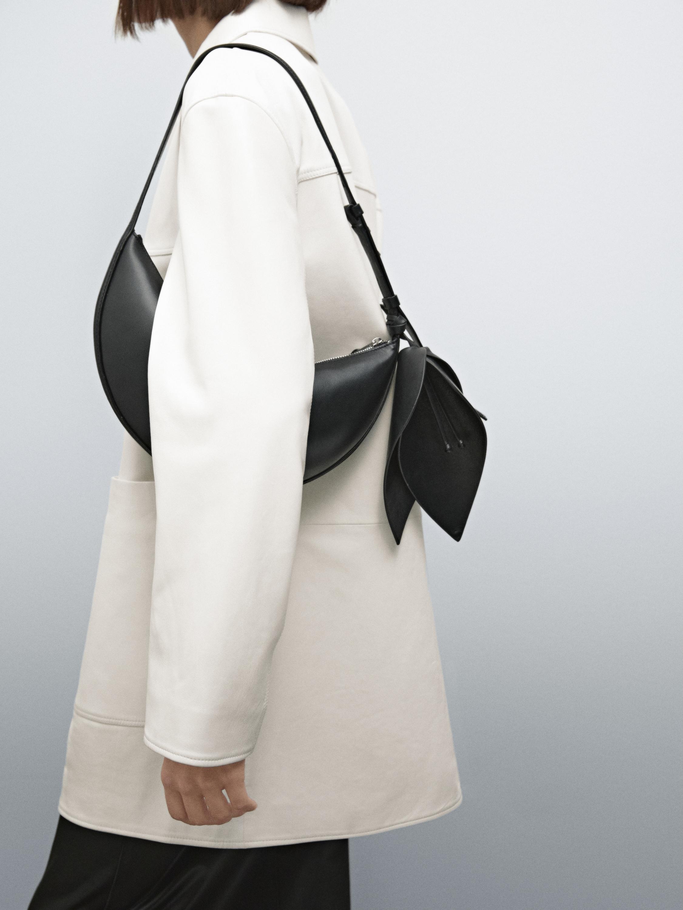 Nappa leather half-moon bag with flower detail