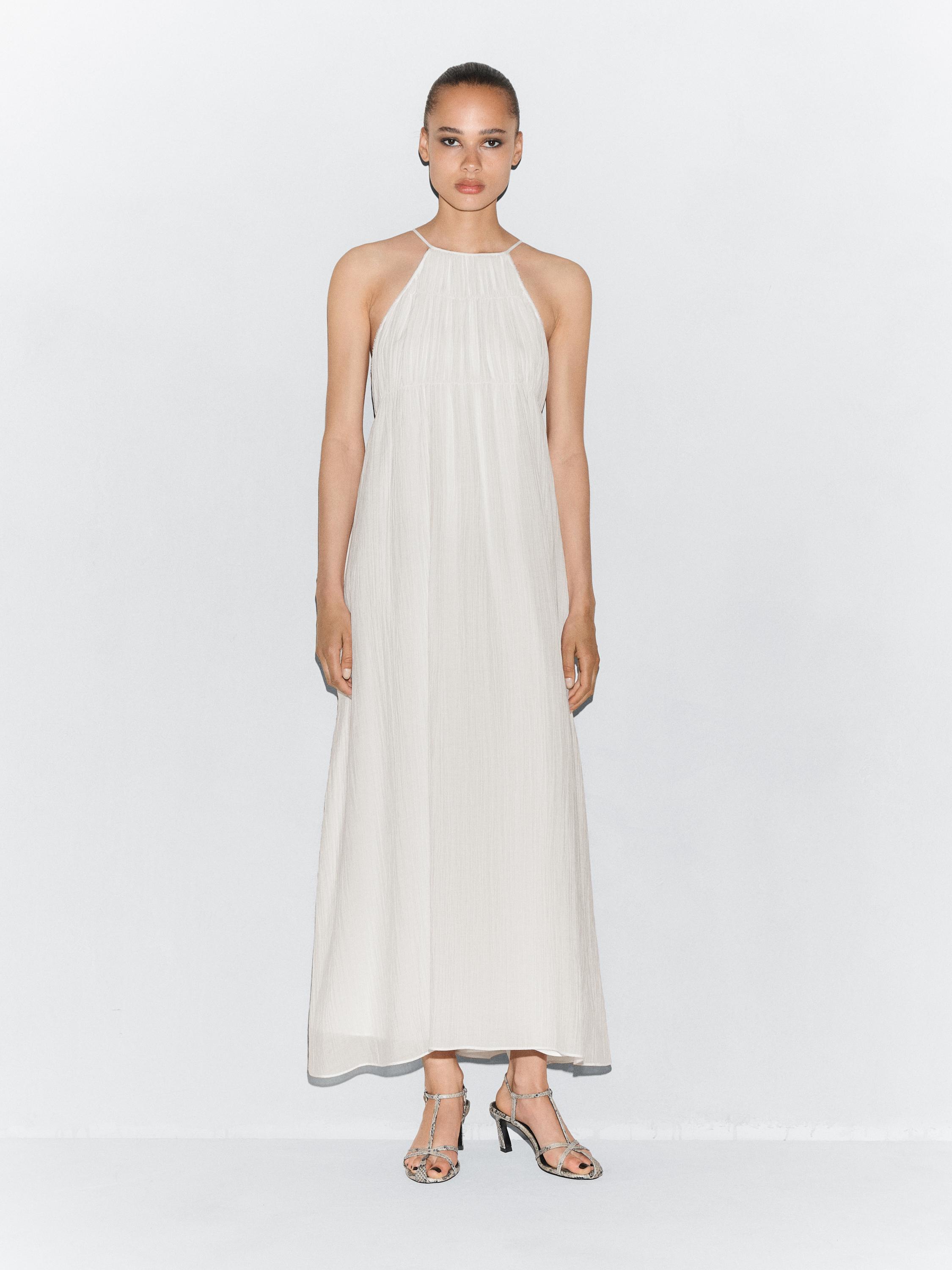 Long pleated dress with gathered detail
