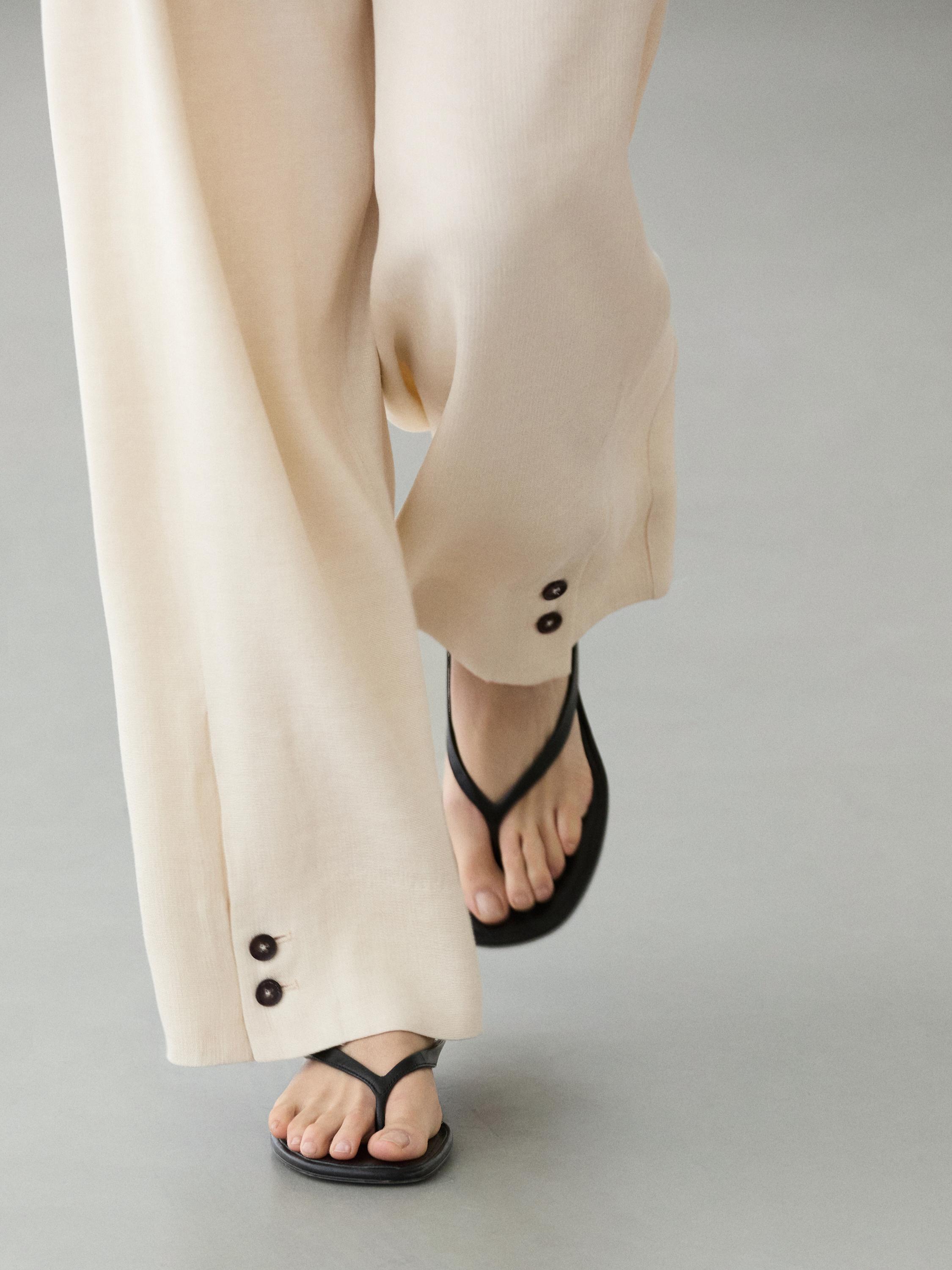 Linen blend suit trousers with button detail — CREAM