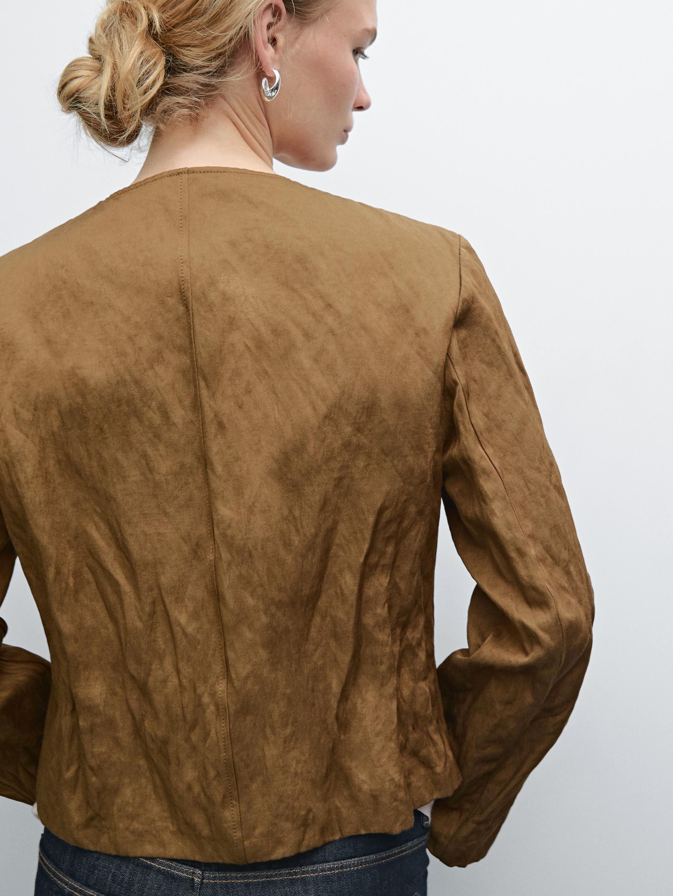 Short jacket with fabric detail