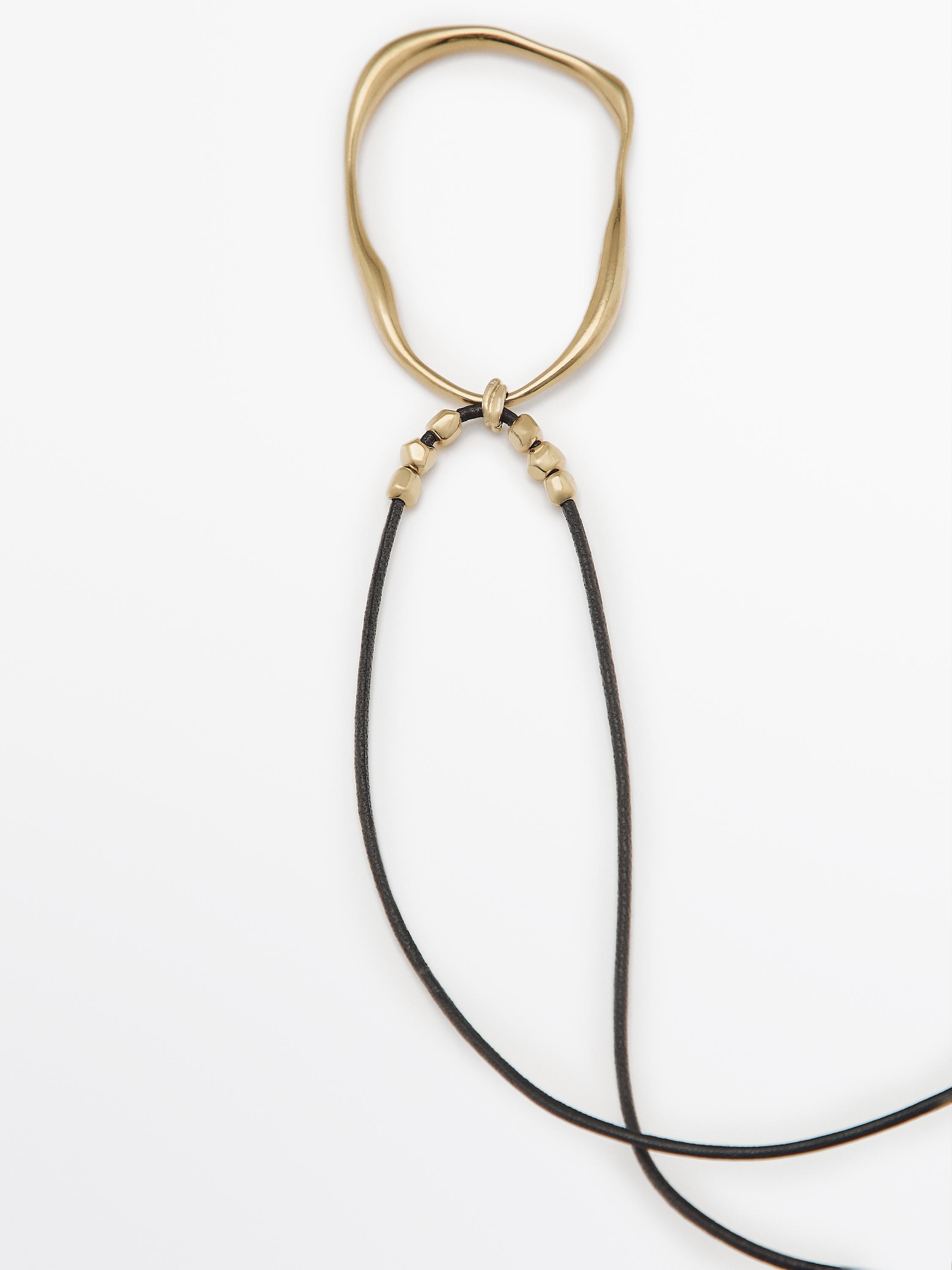 Leather cord necklace with asymmetric piece
