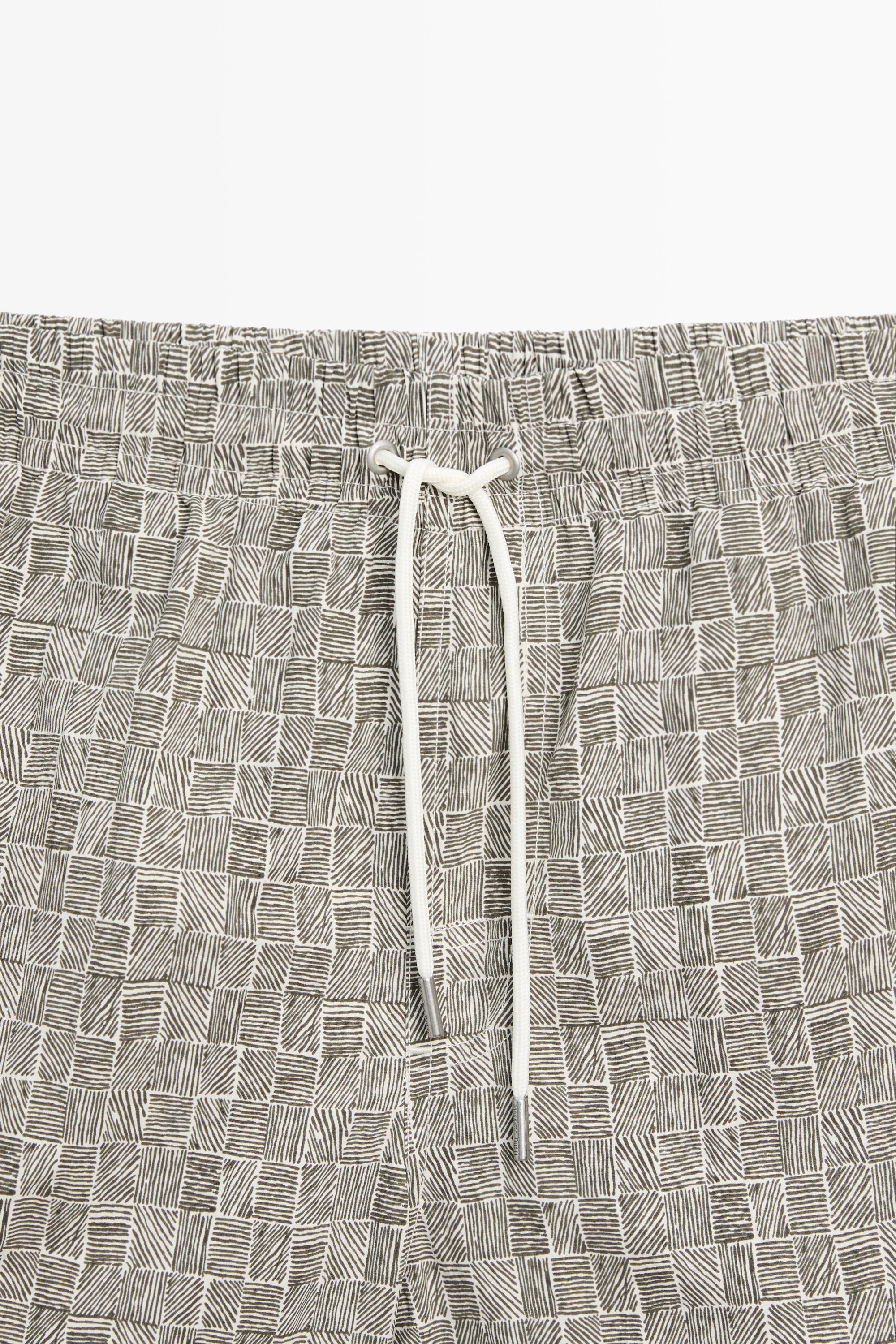 Printed swimming trunks — KHAKI