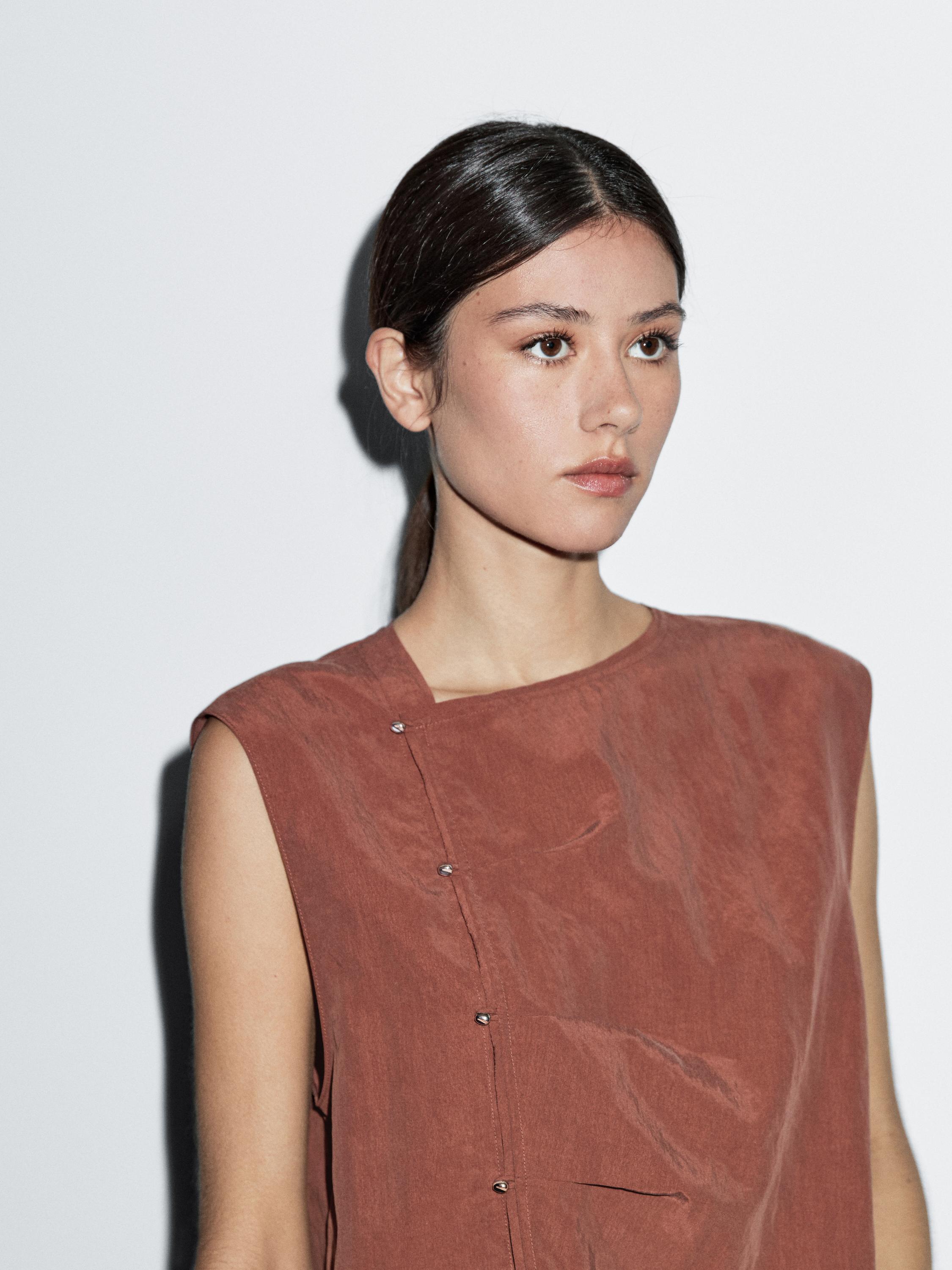 Blouse boutonnage côté argenté