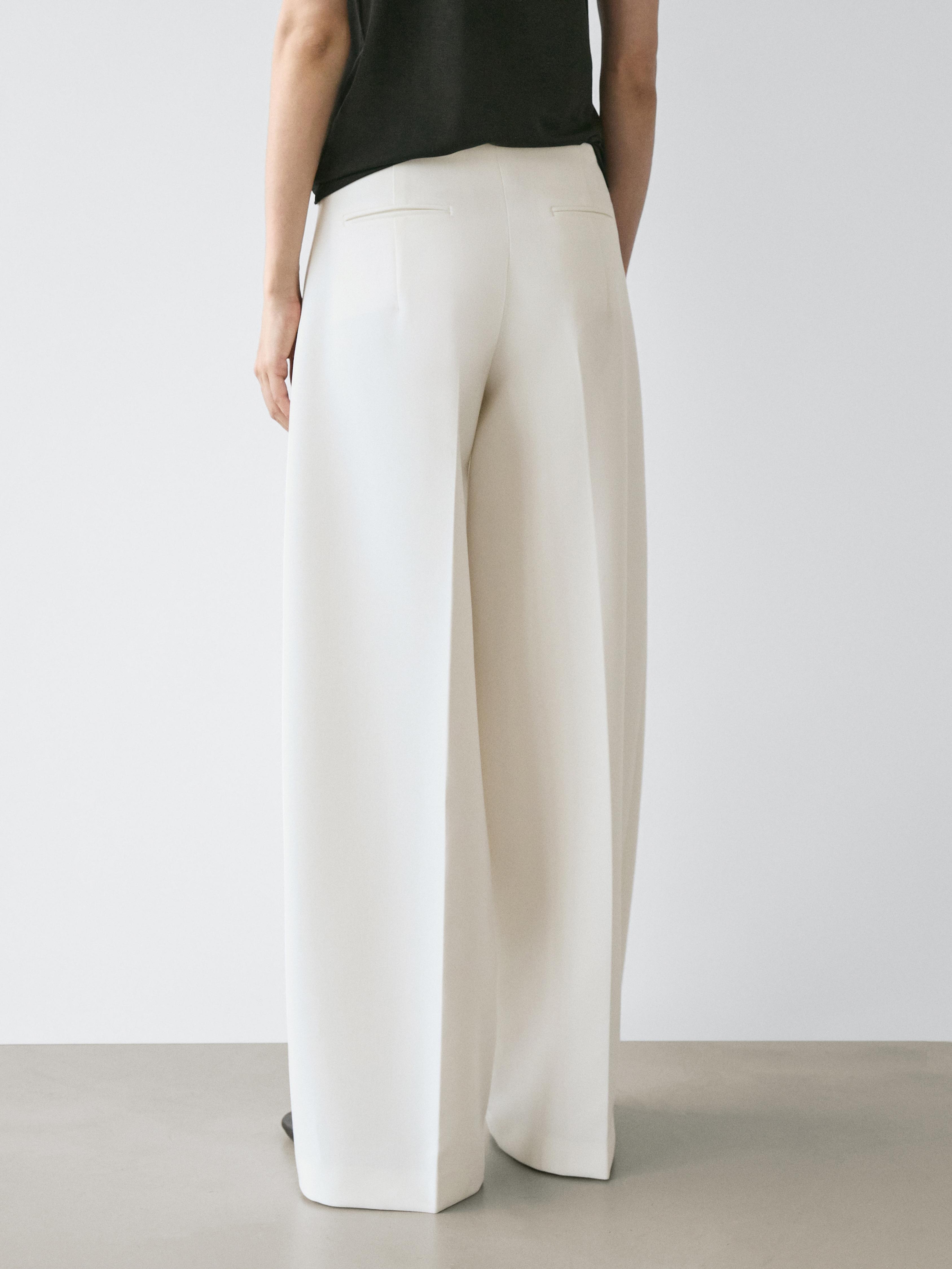 Wide-leg voluminous trousers — CREAM