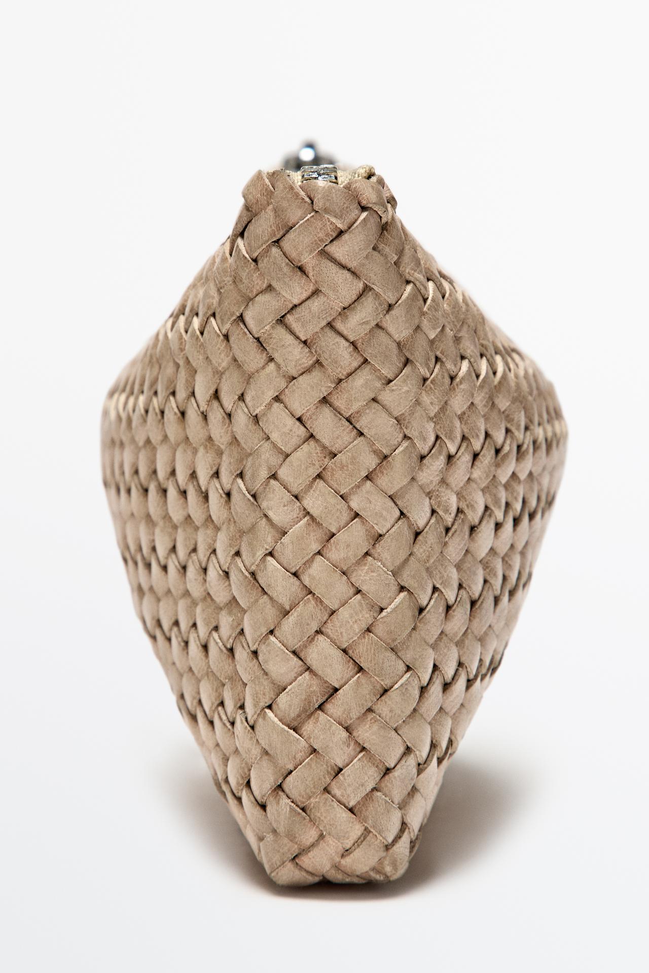 Braided nappa leather pouch bag — CREAM