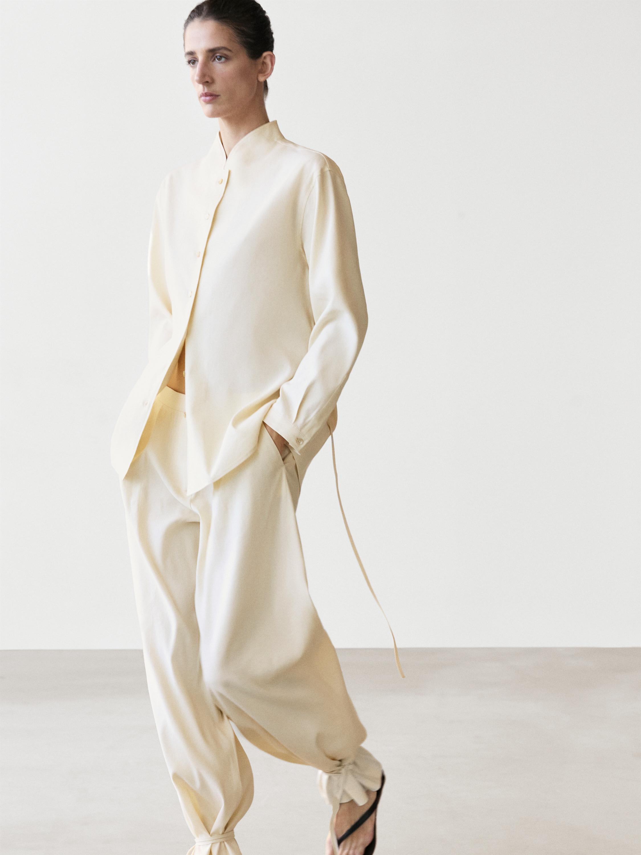 Flowing barrel fit trousers — CREAM