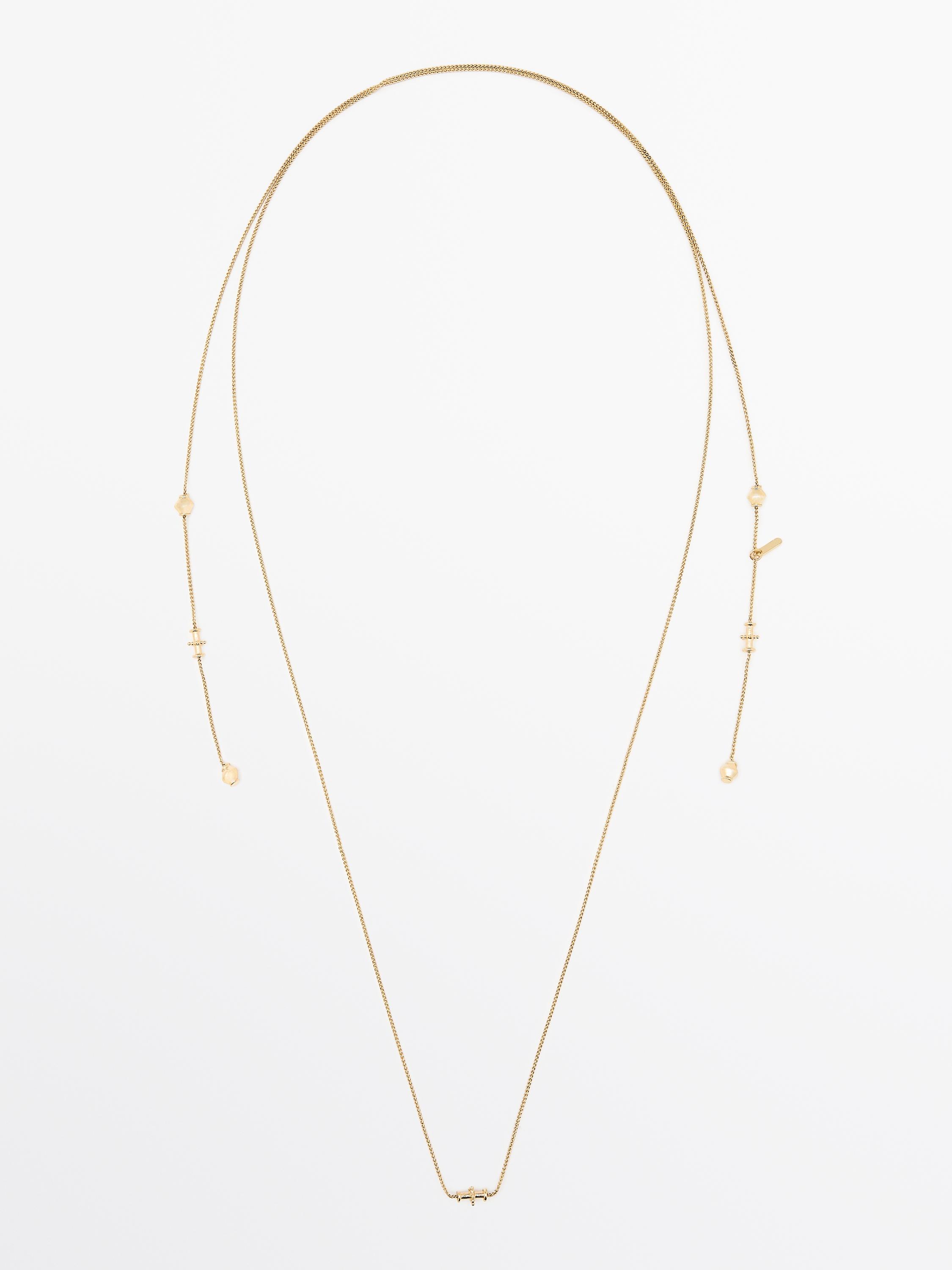 Collana con elementi multi-posizione