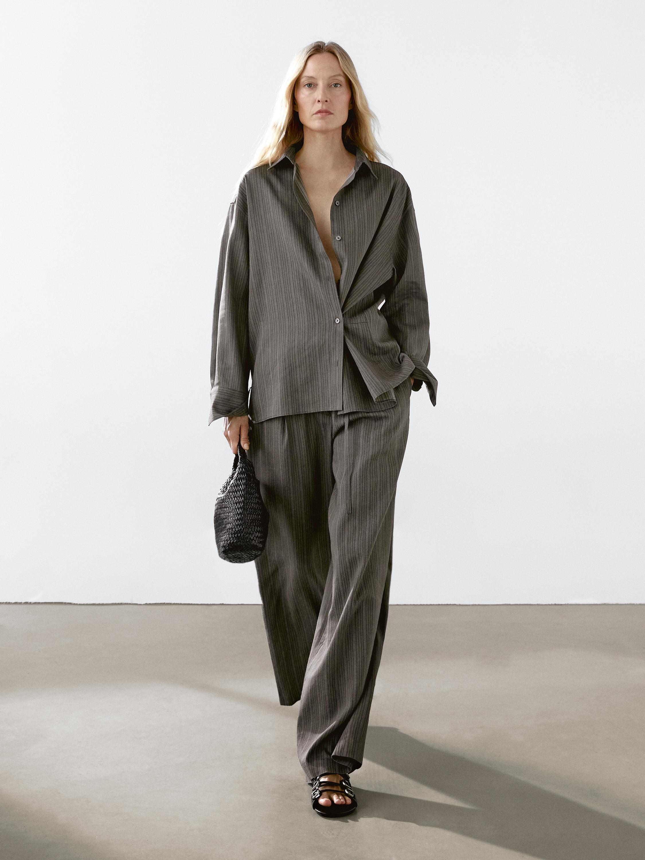 Multi-stripe trousers with belt detail