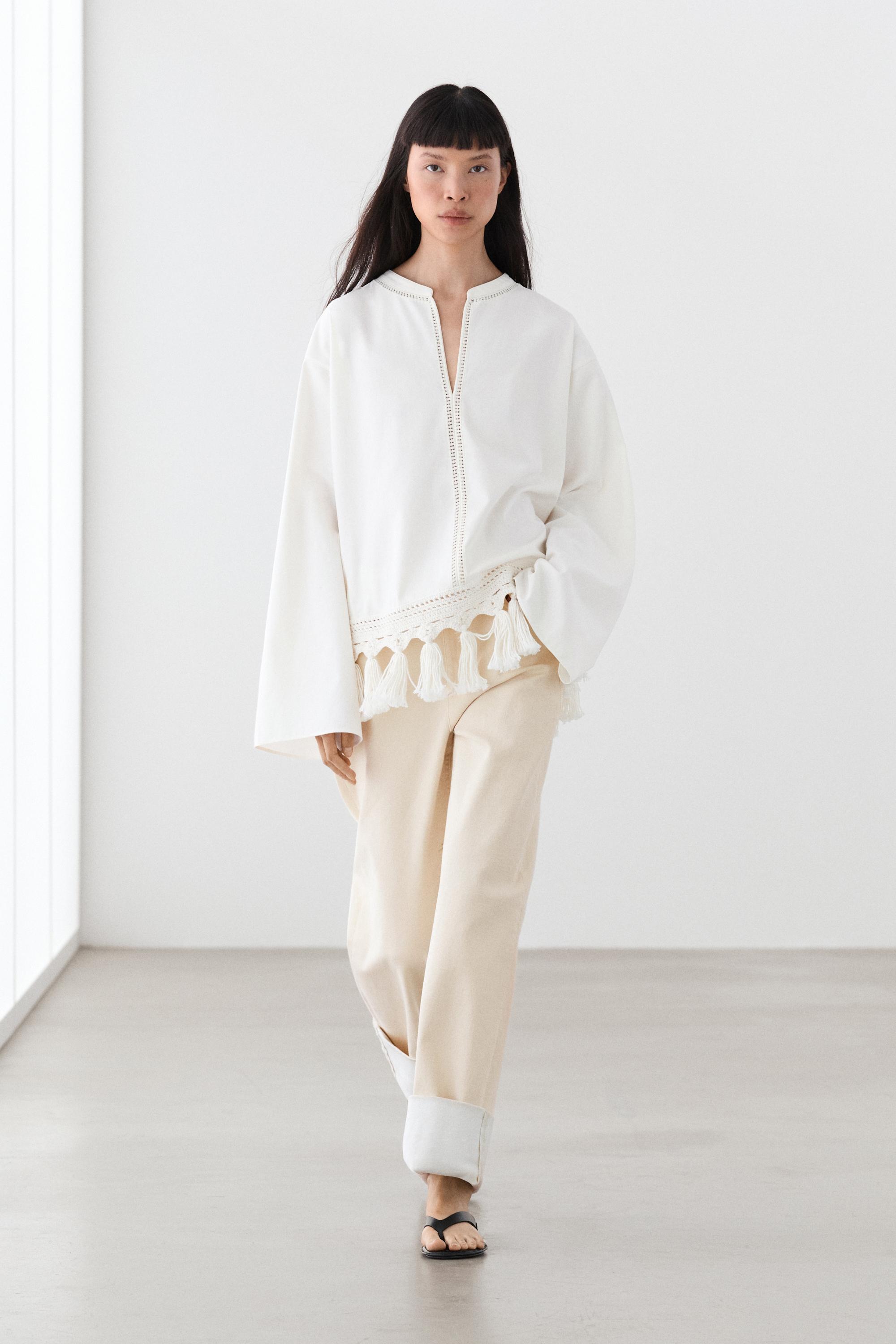 Embroidered blouse with fringed hem — WHITE