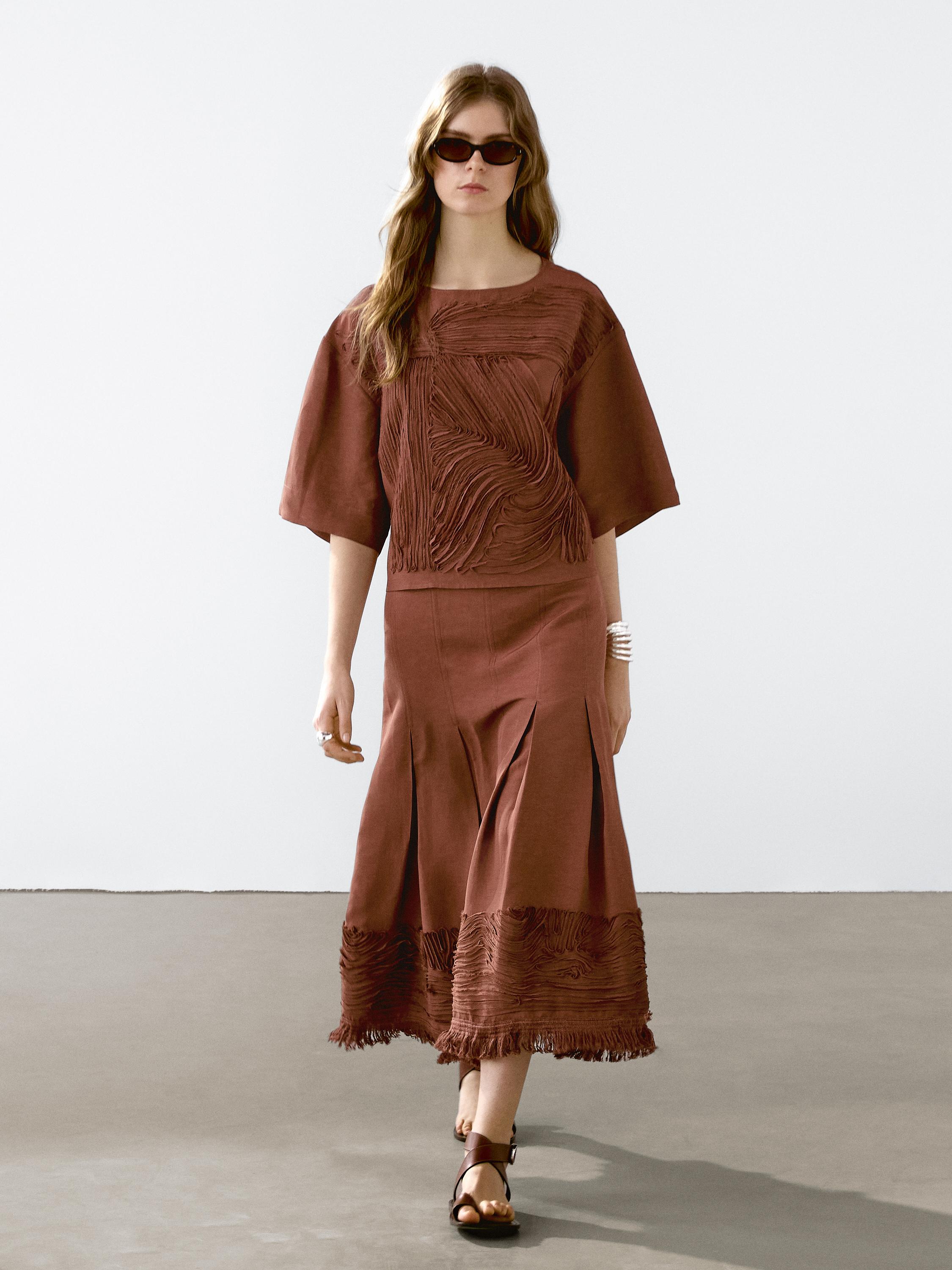 Flowing top with embroidered detail