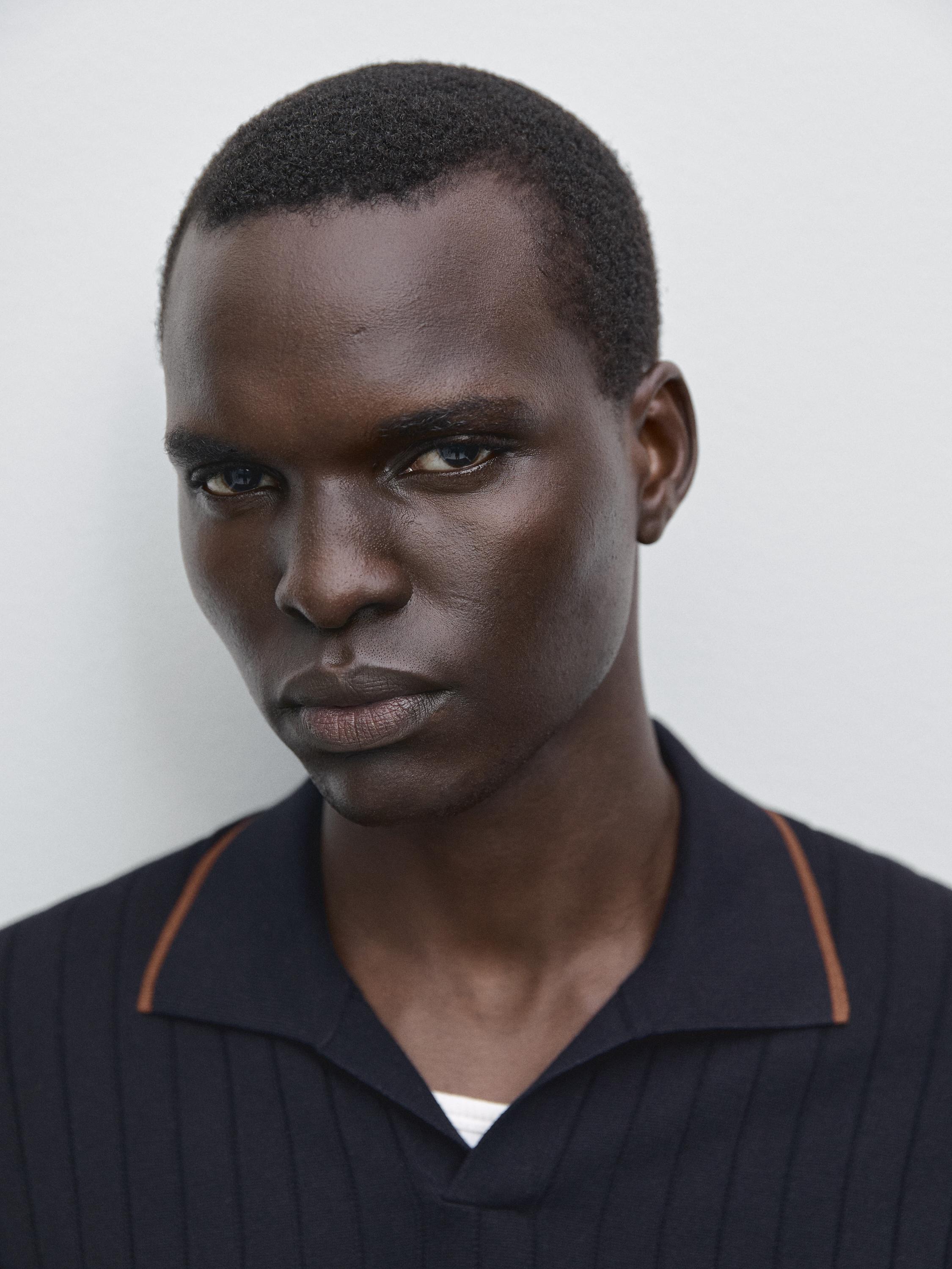 Polo in maglia a costine