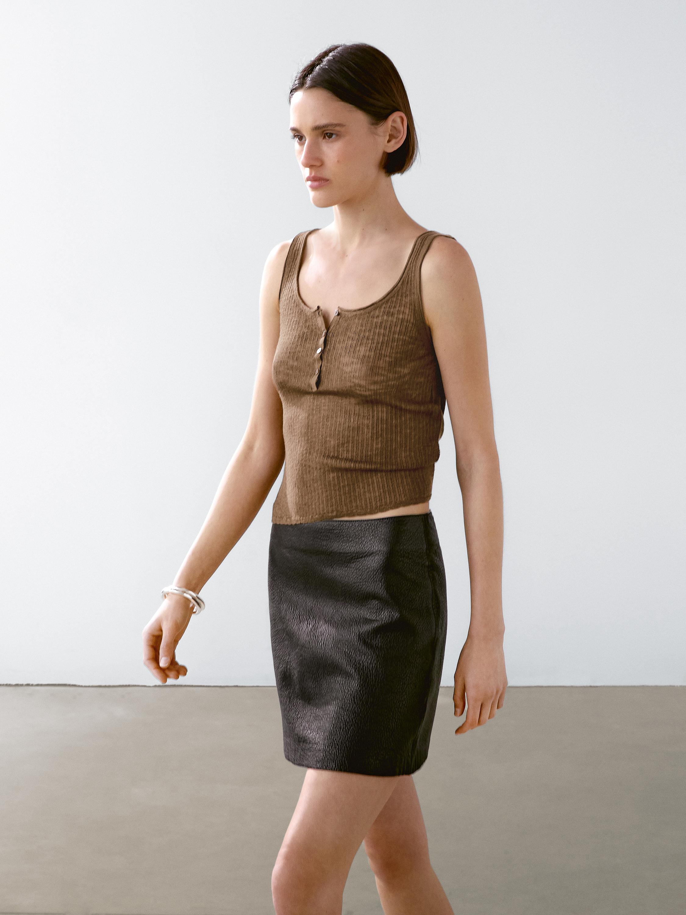 Textured nappa leather mini skirt