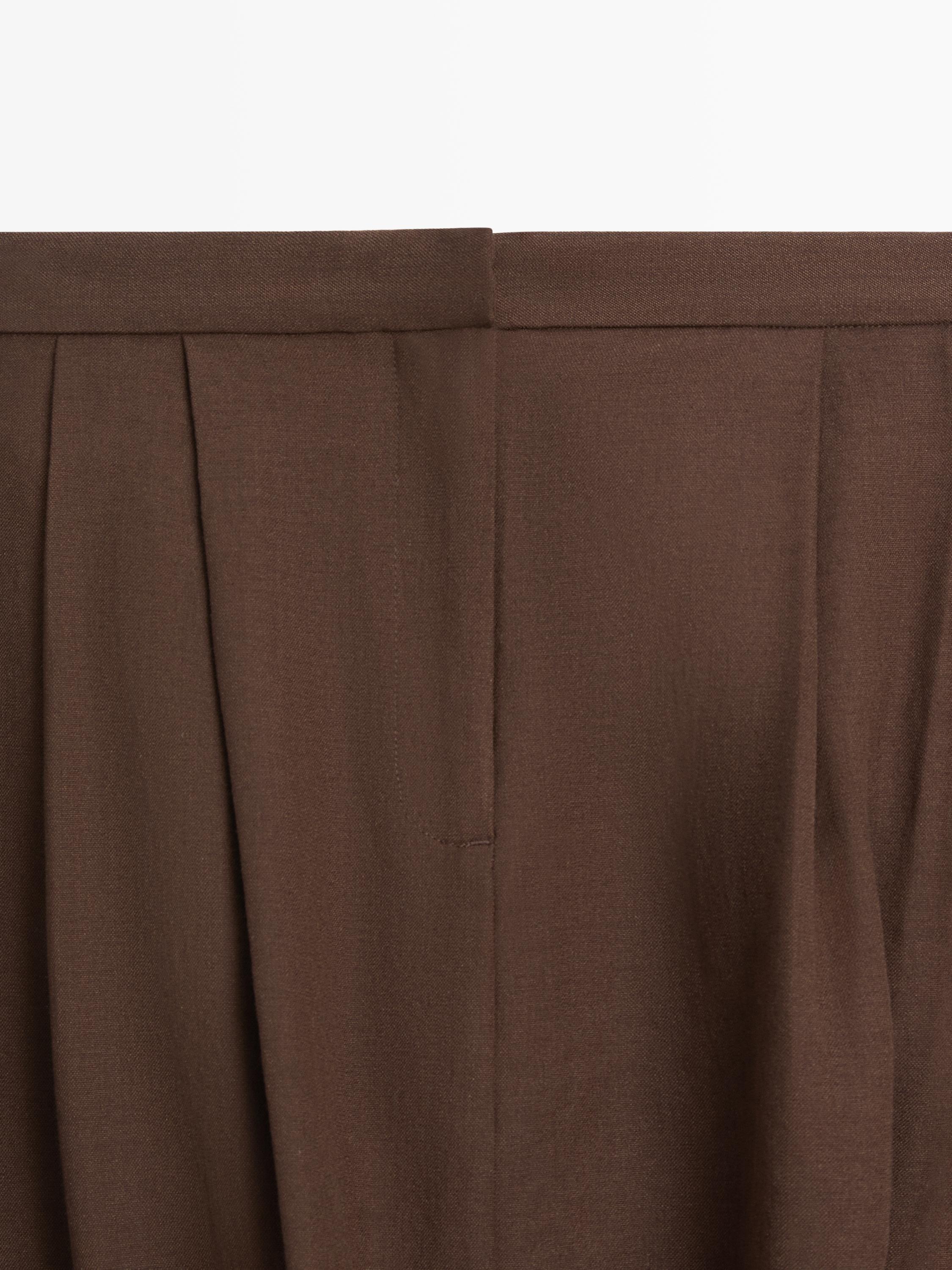 Baggy trousers with pleated details — BROWN