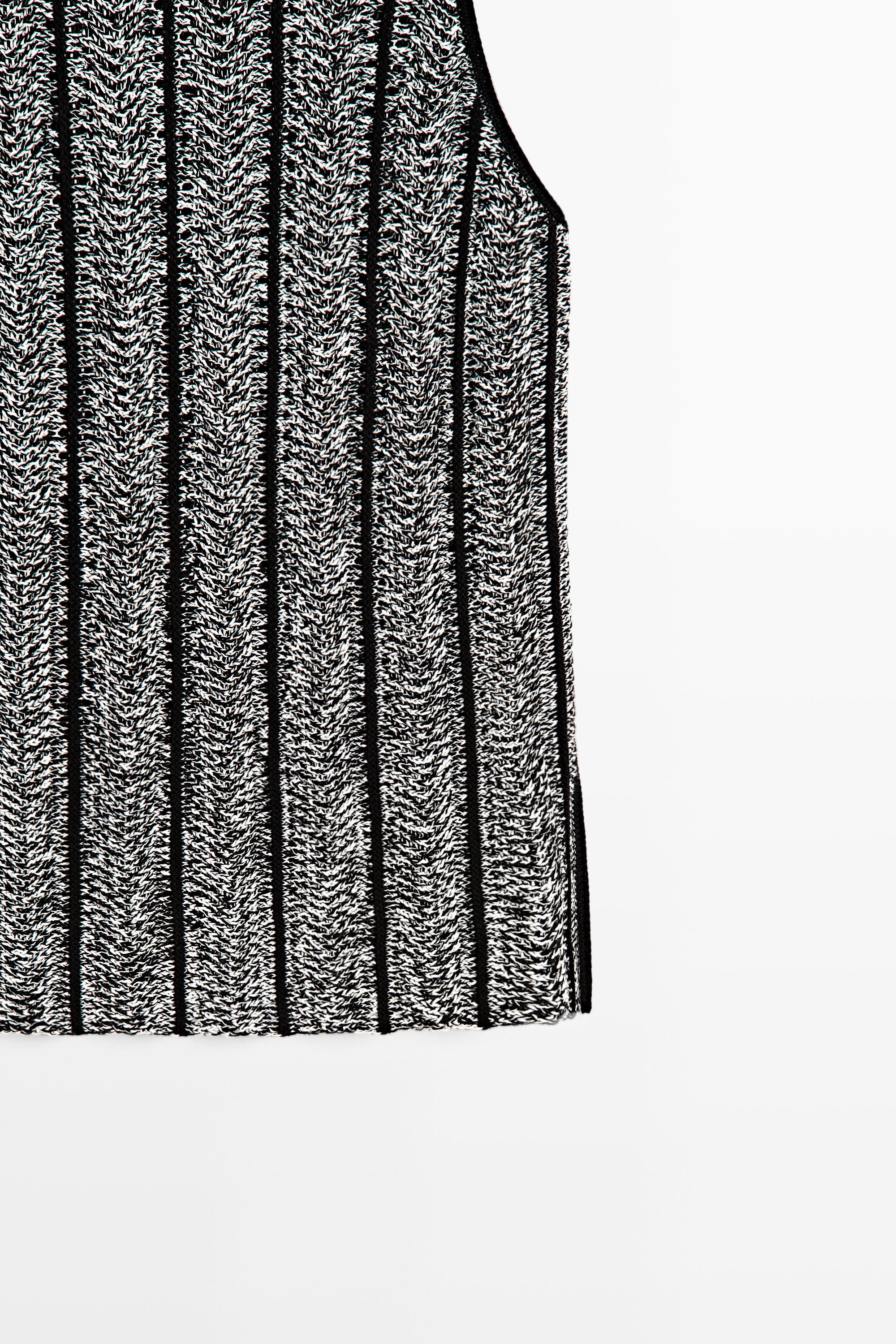 Cotton-blend flecked knit top — BLACK