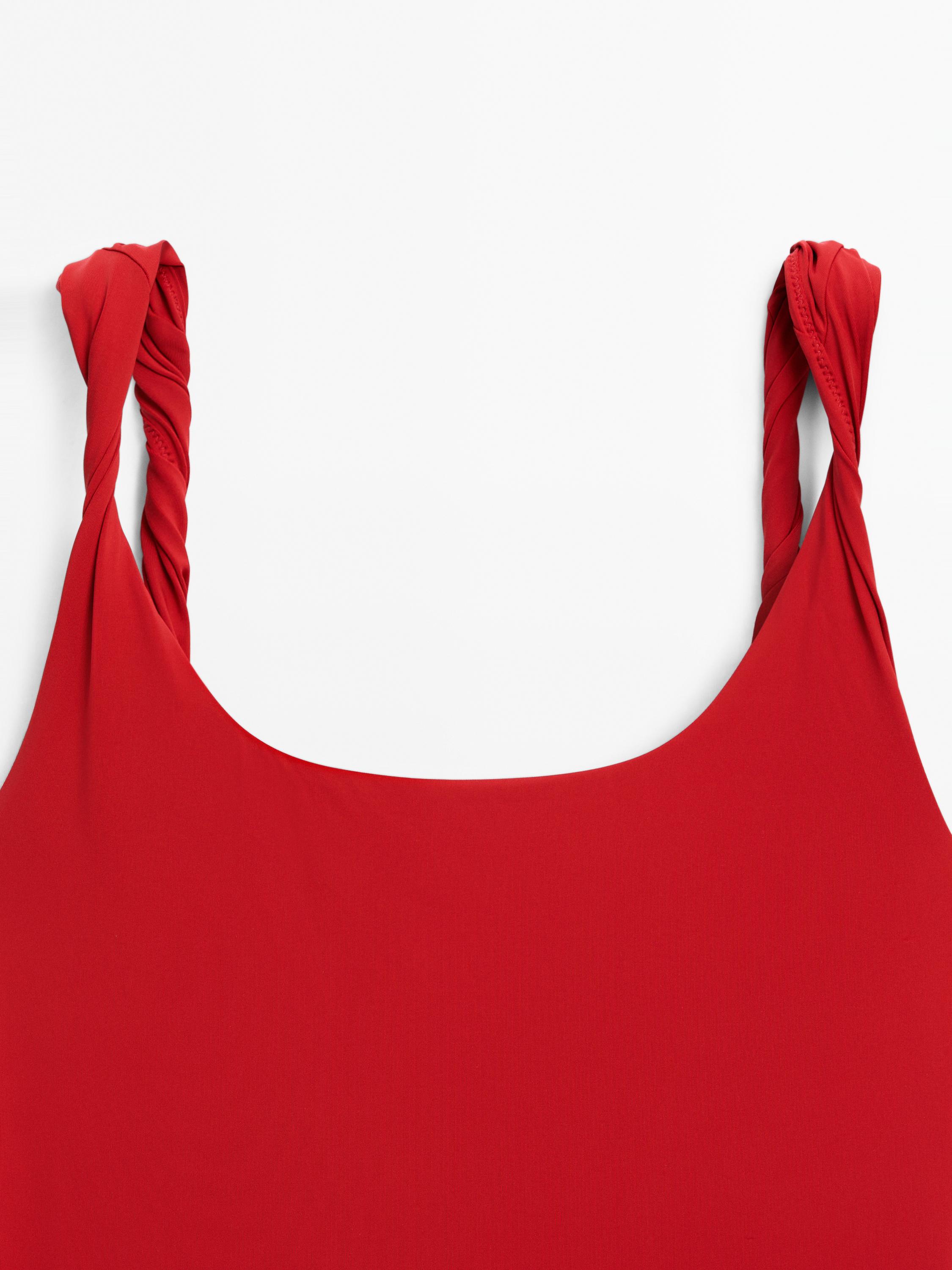Costume con spalline attorcigliate