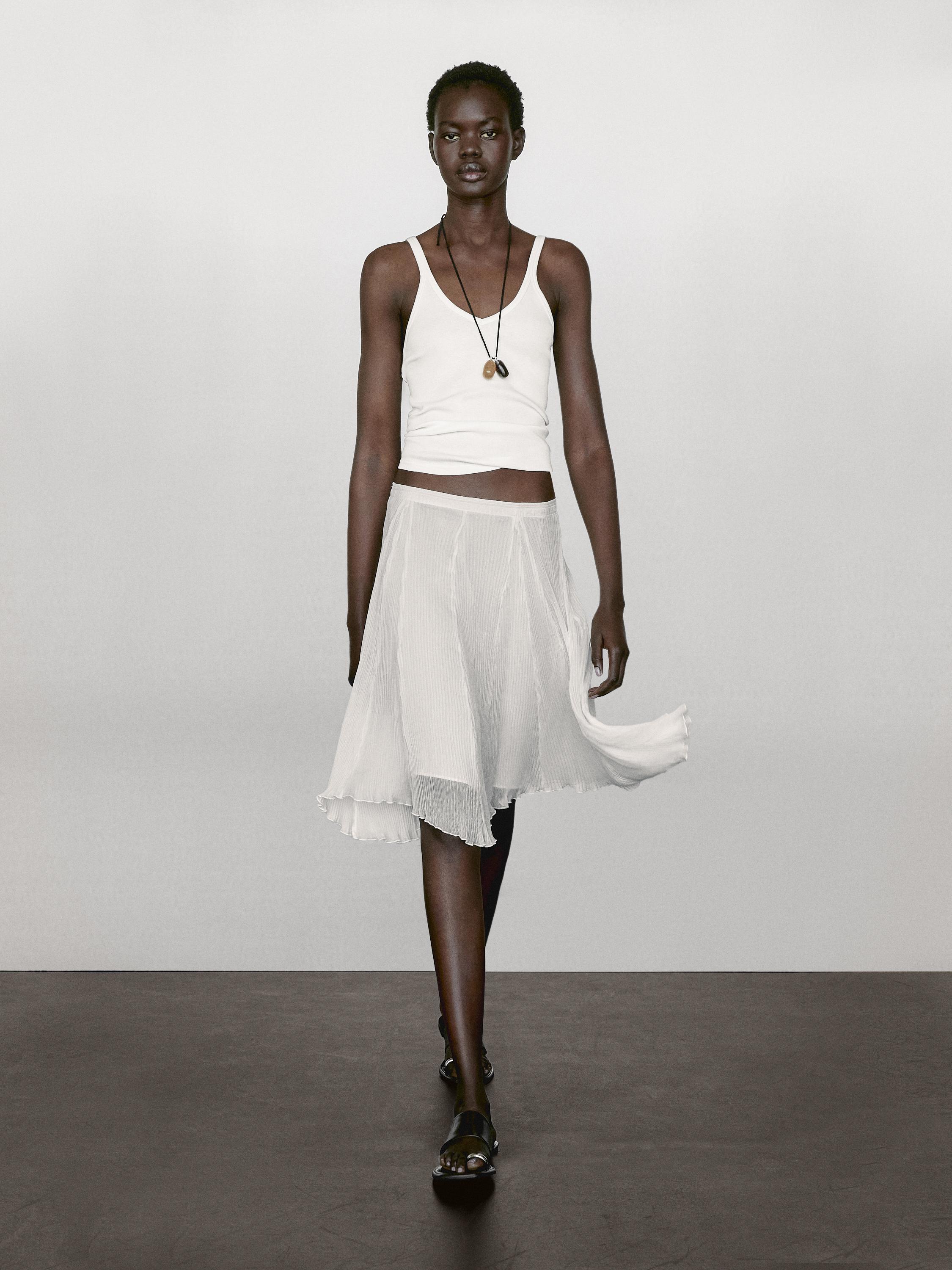 Top col V en tissu côtelé