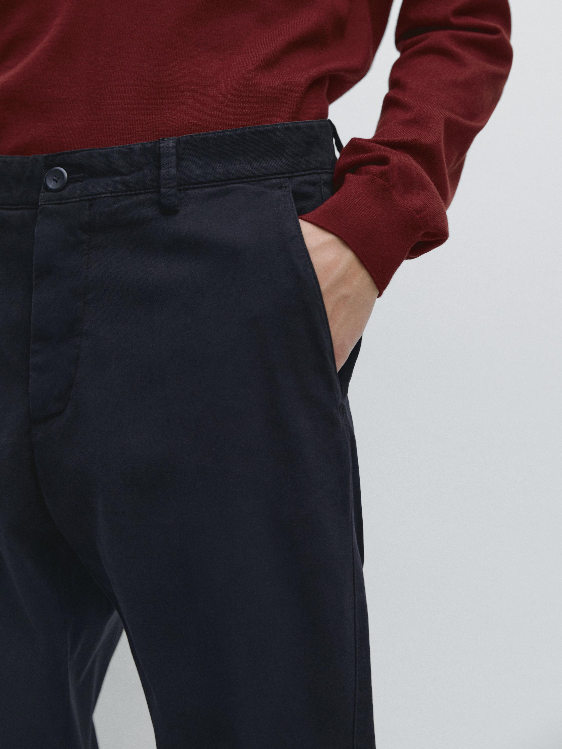 Slim-fit micro-textured trousers — NAVY BLUE