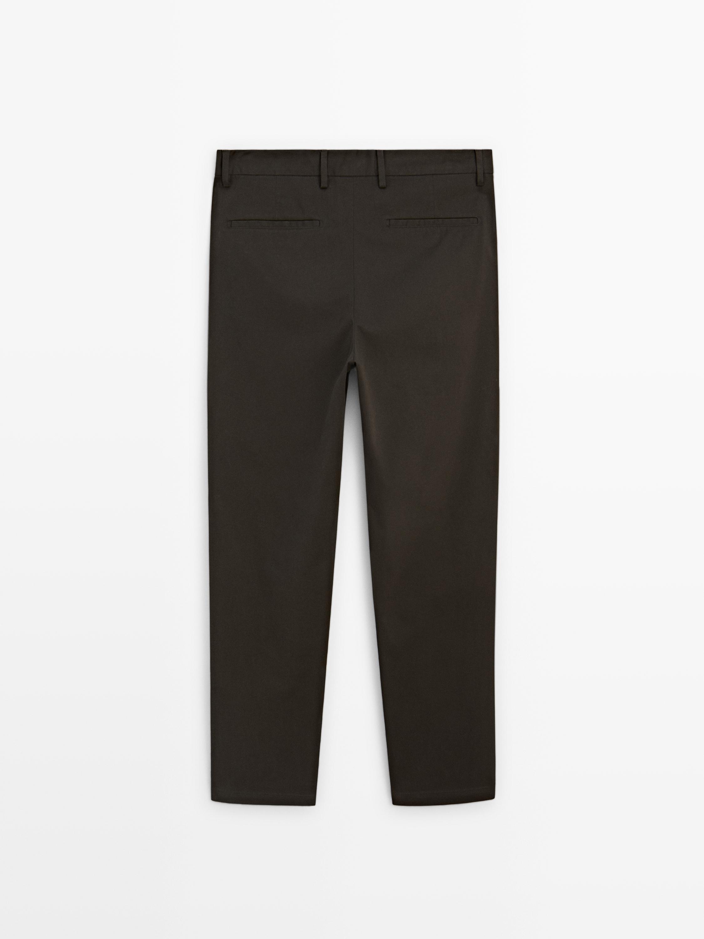 Pantalón slim fit 100% algodón