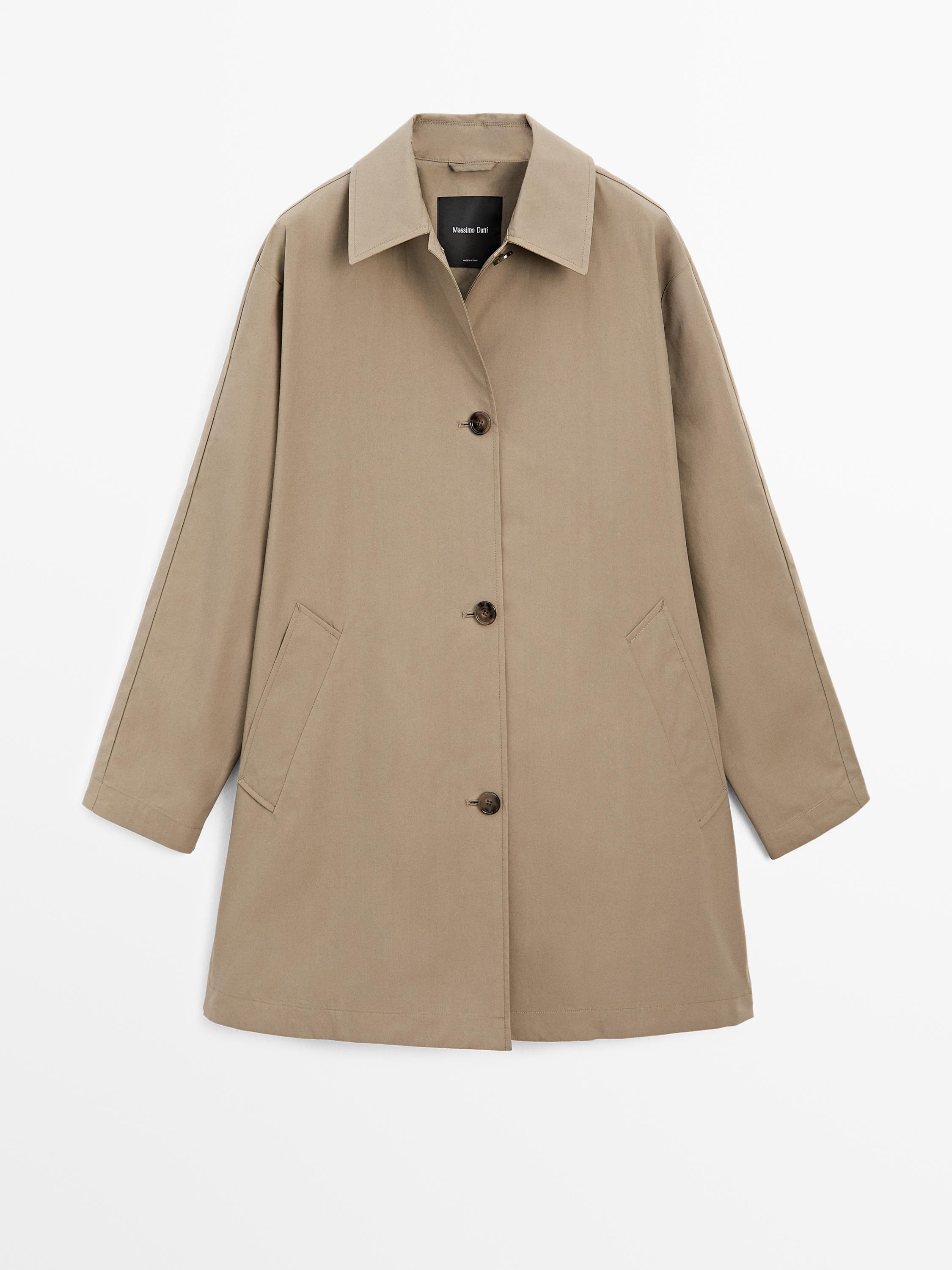 Trench coat with detachable scarf detail