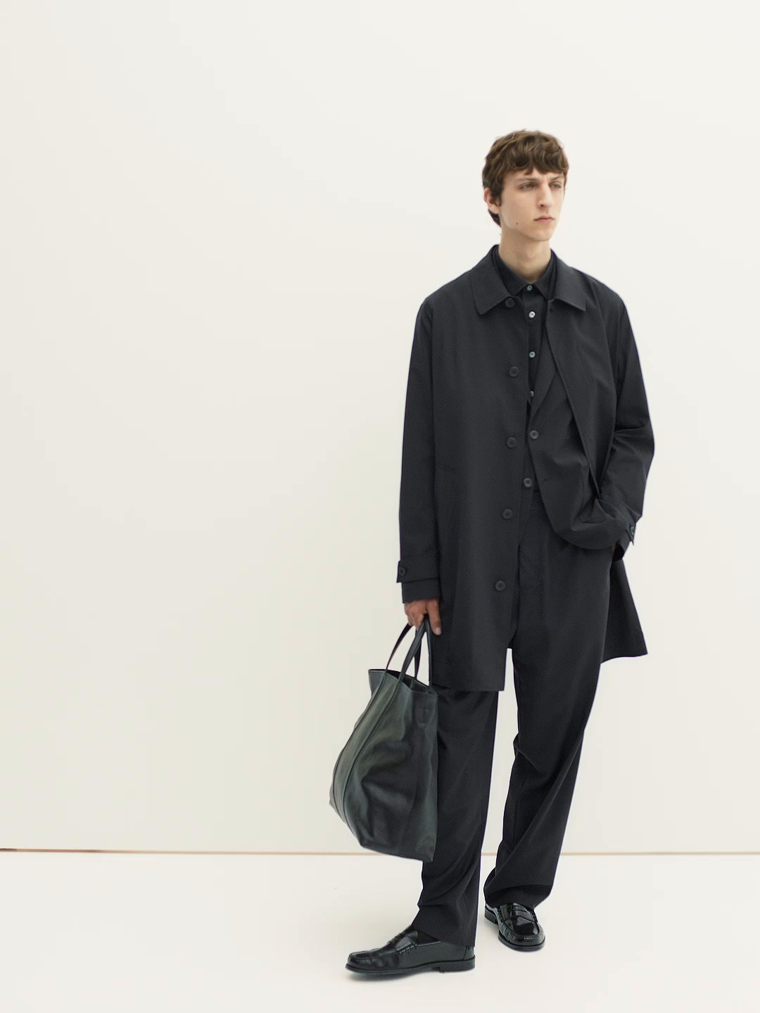 Lightweight trench coat with hidden buttons