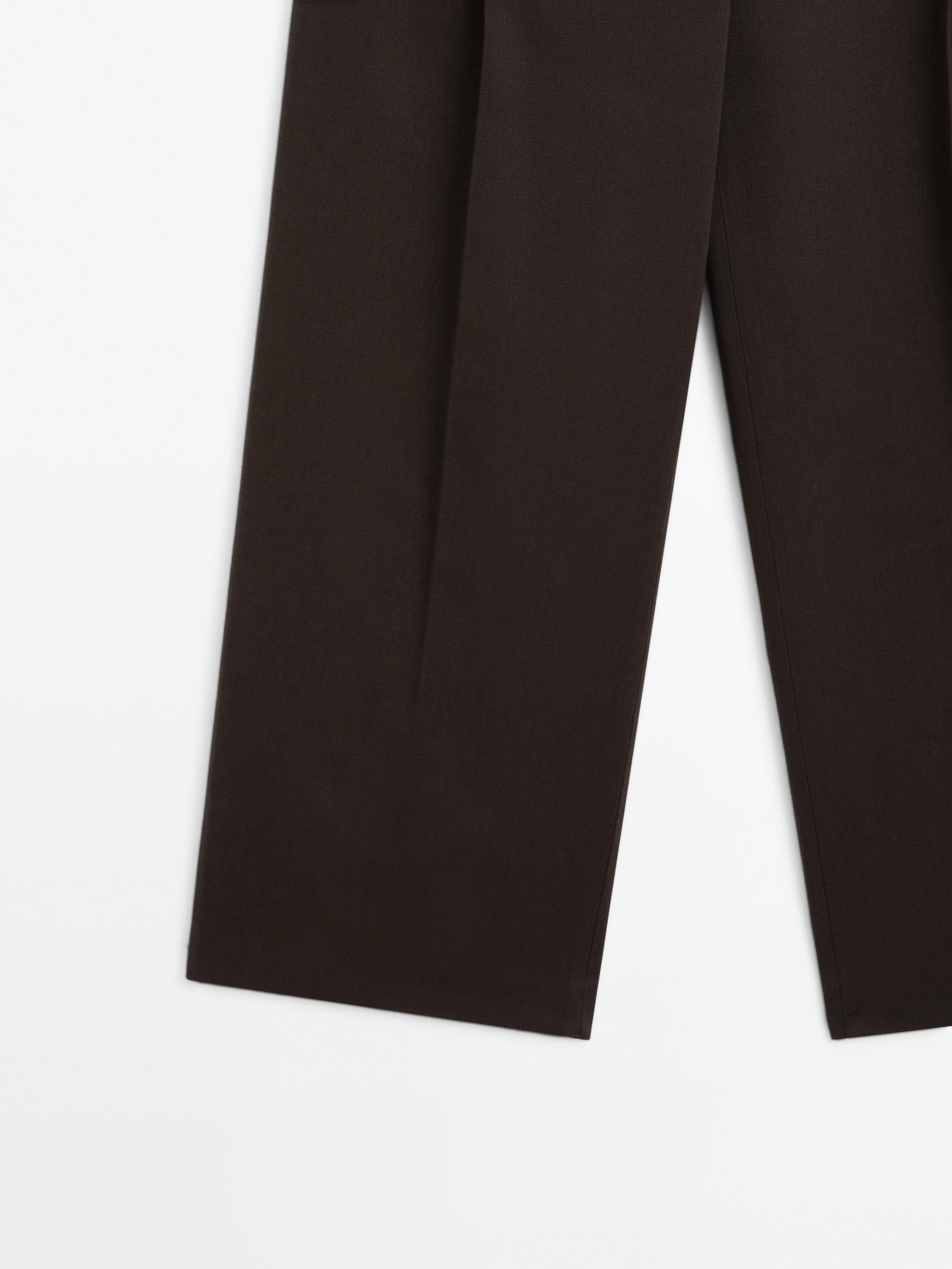 Wide-leg pleated cotton blend trousers