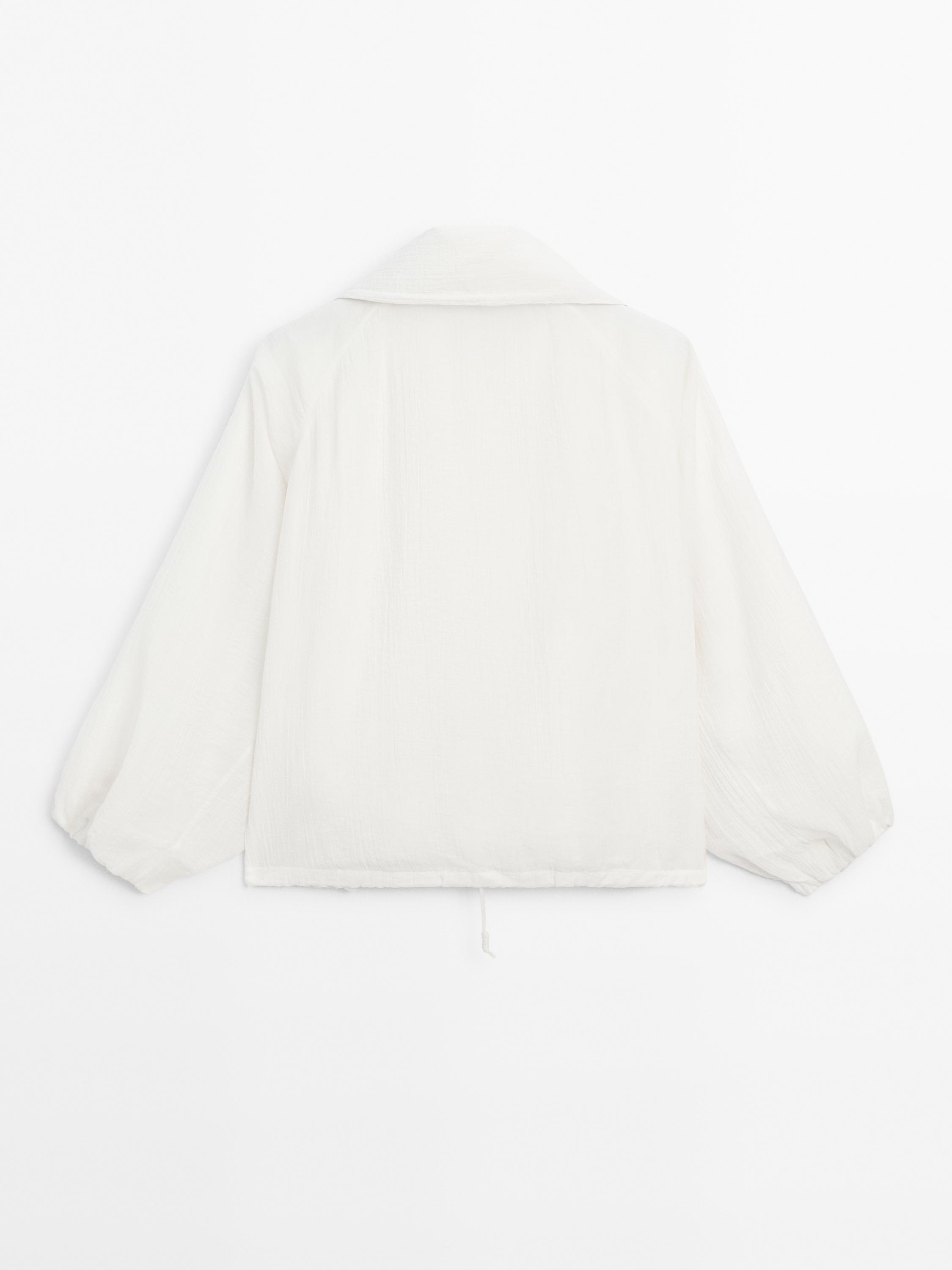 Flowing bomber jacket with voluminous detail