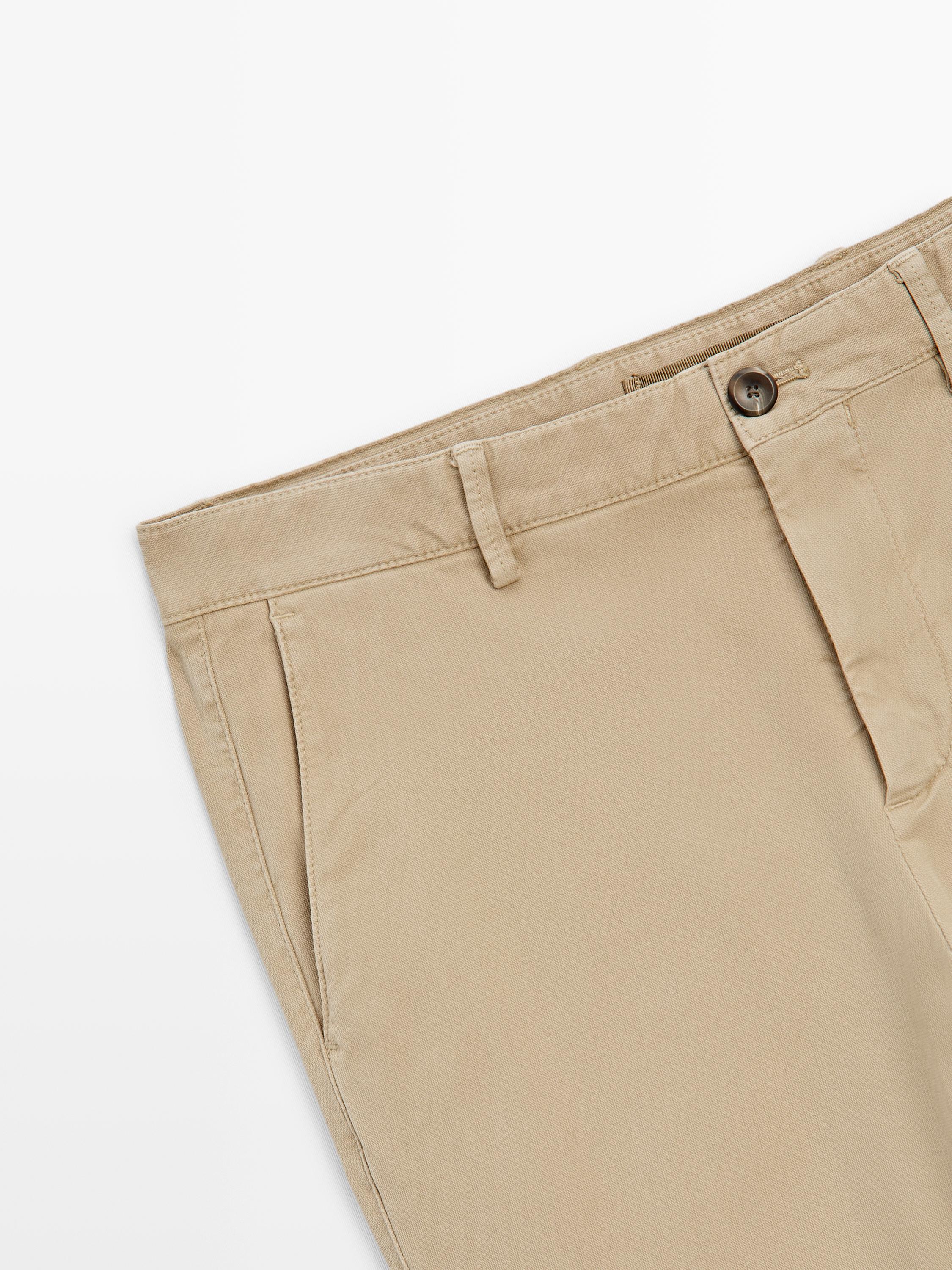Slim-fit micro-textured trousers — OCHRE