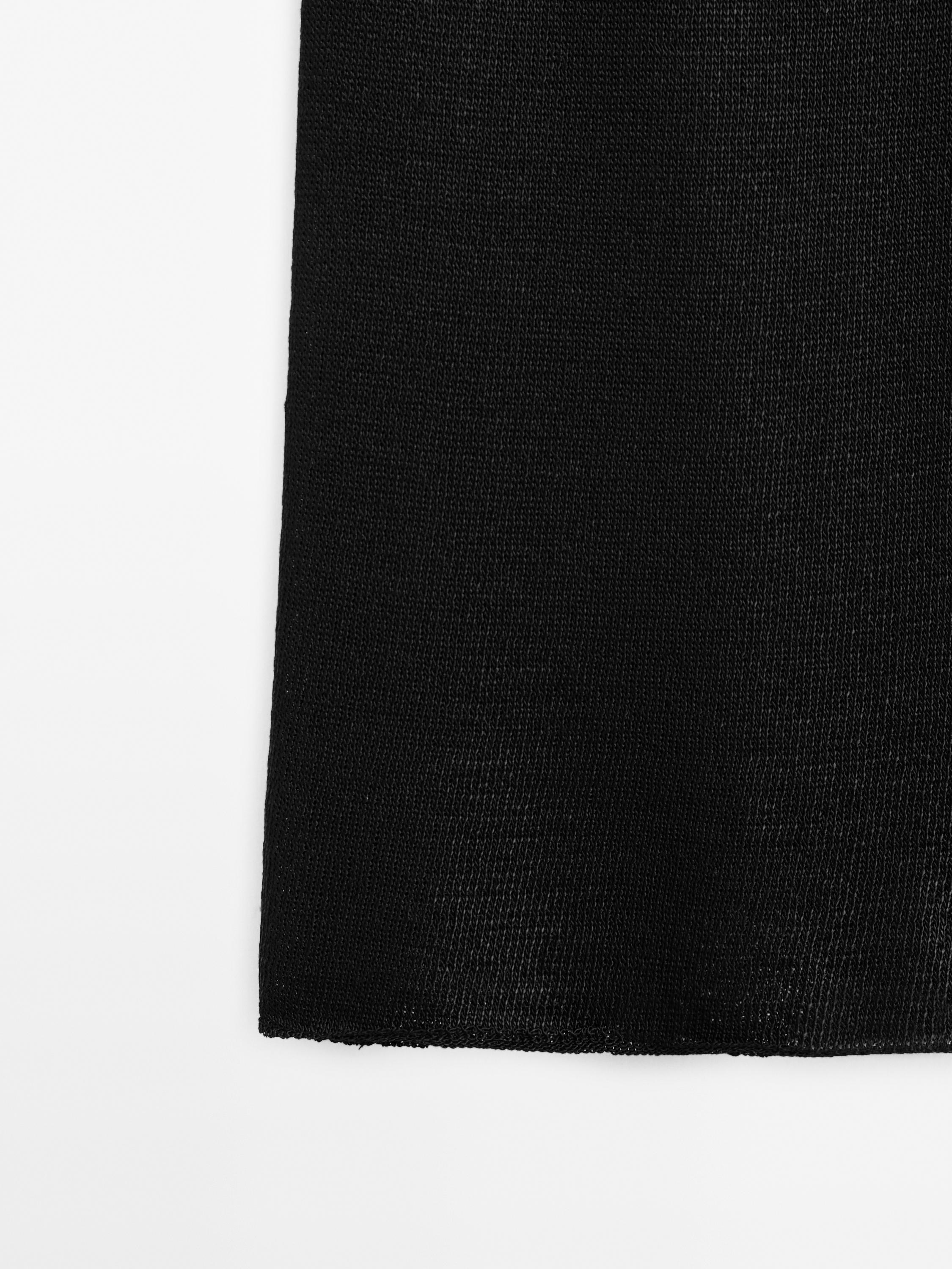 Jupe midi en maille ajourée