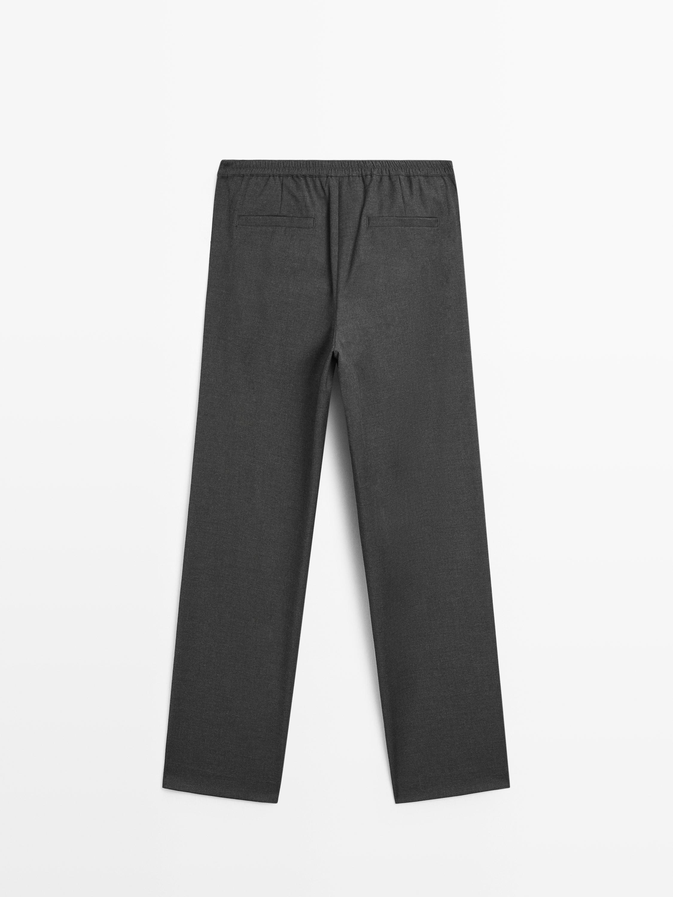 Dart trousers with elastic waistband