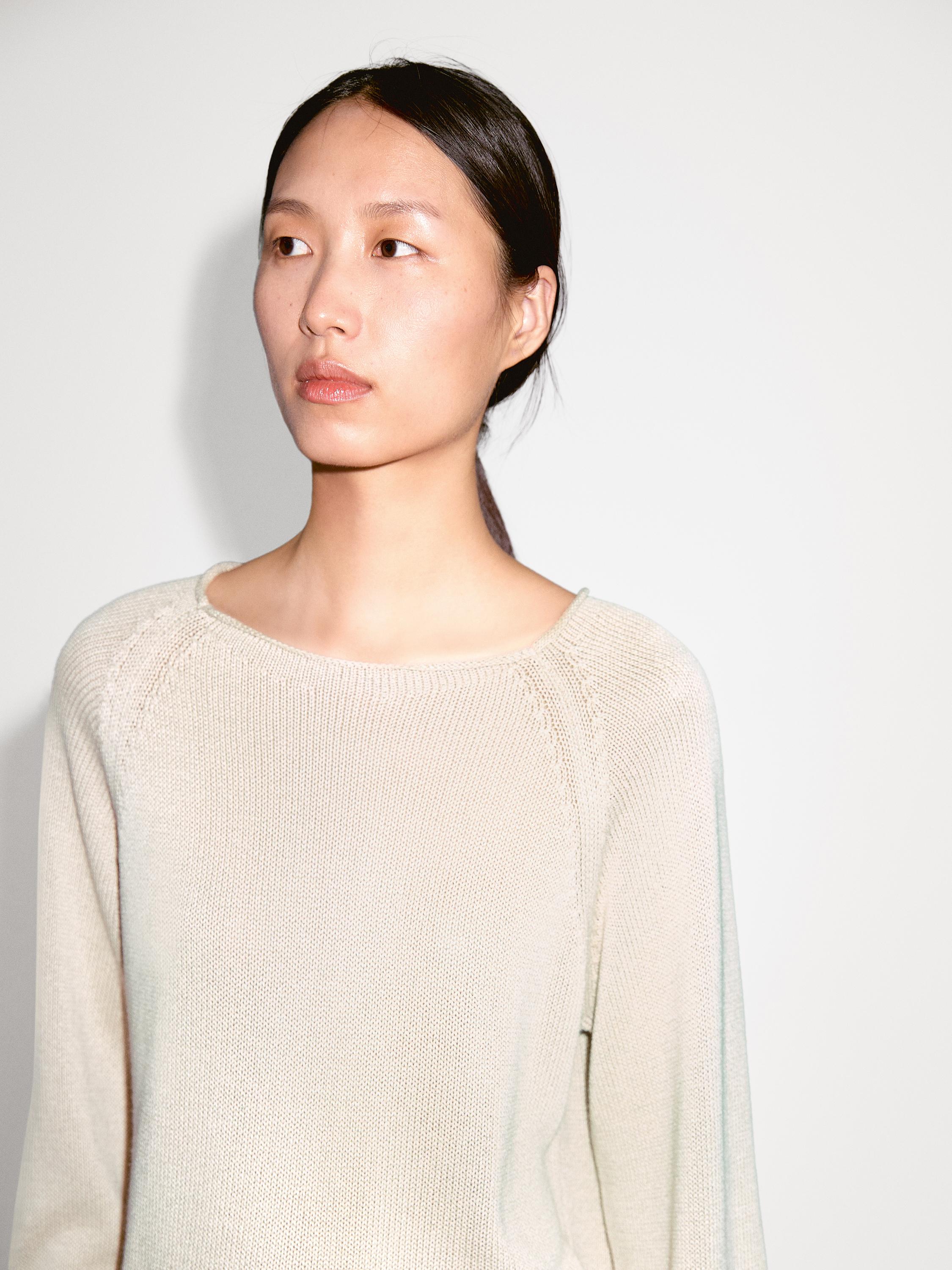 Purl knit cutwork sweater