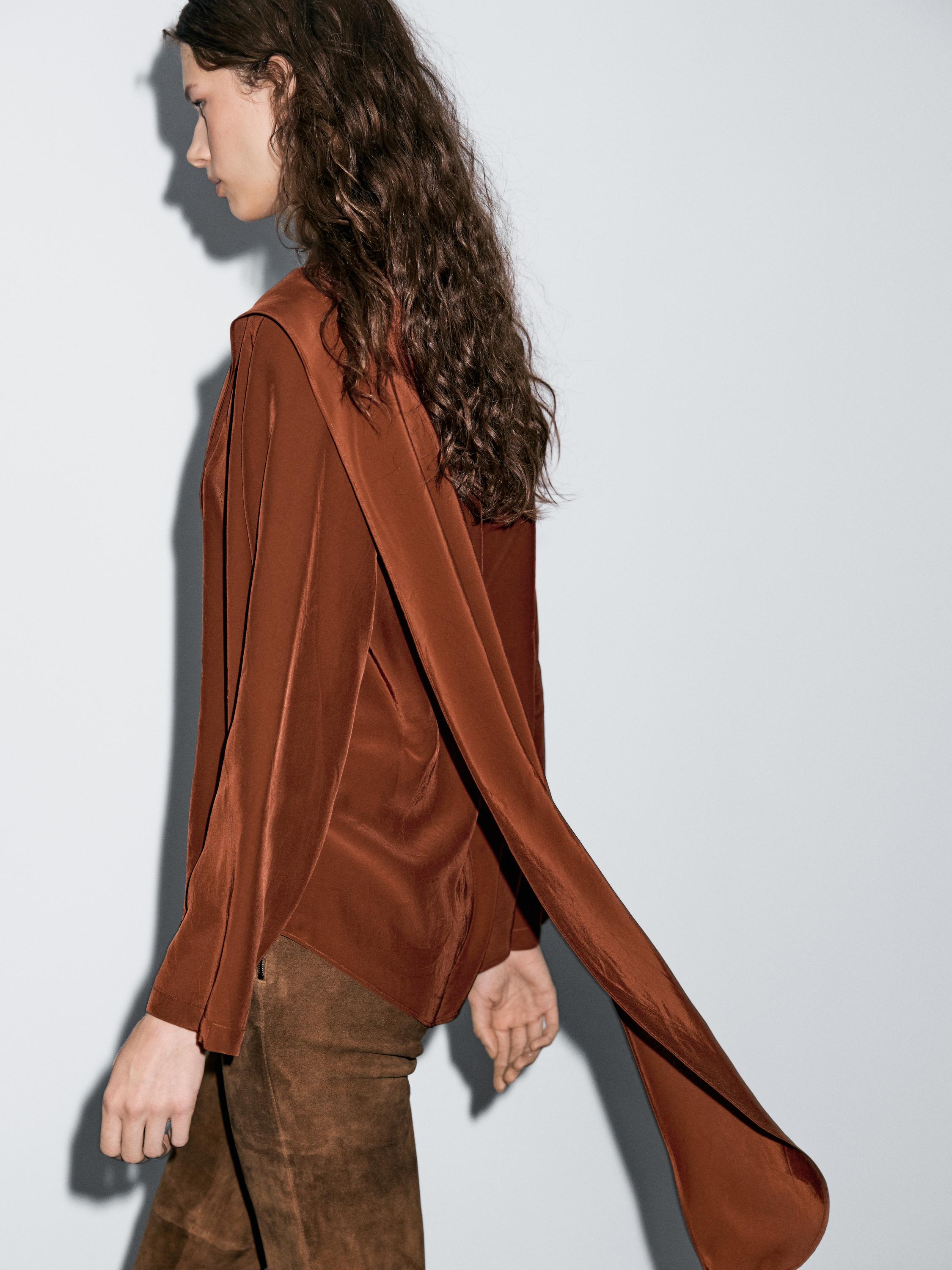 Flowing blouse with tied neck