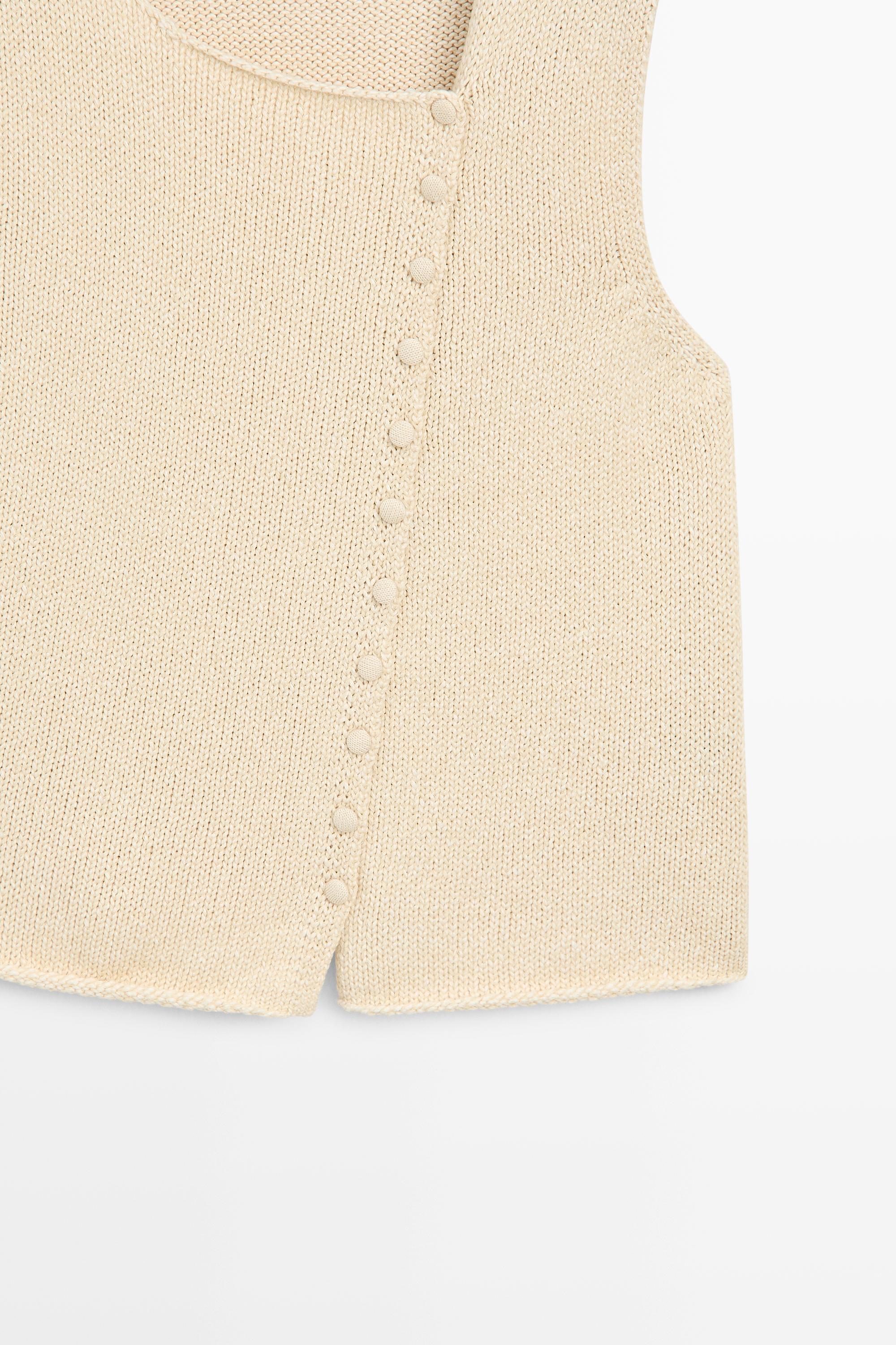 Cotton blend knit top with button detail — CREAM