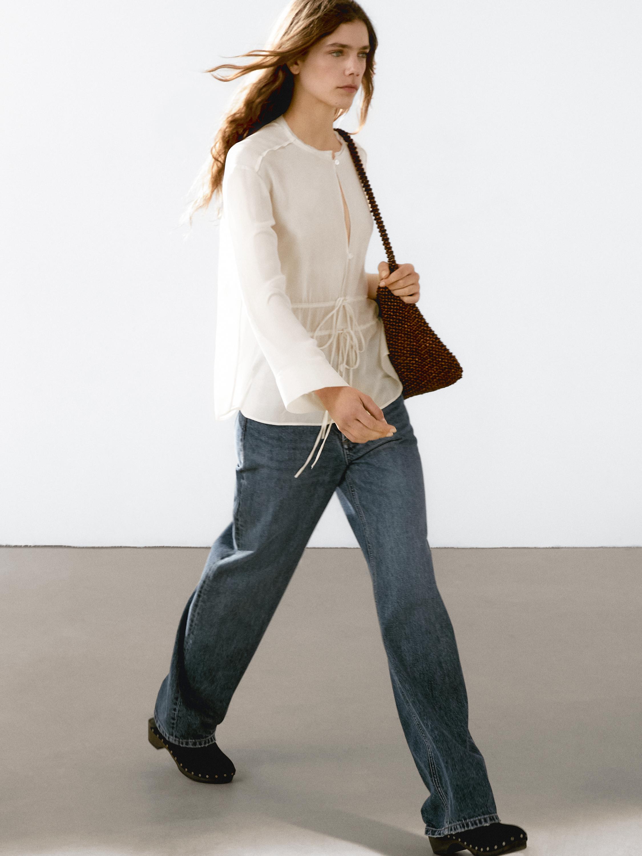 Flowing semi-sheer blouse with ties