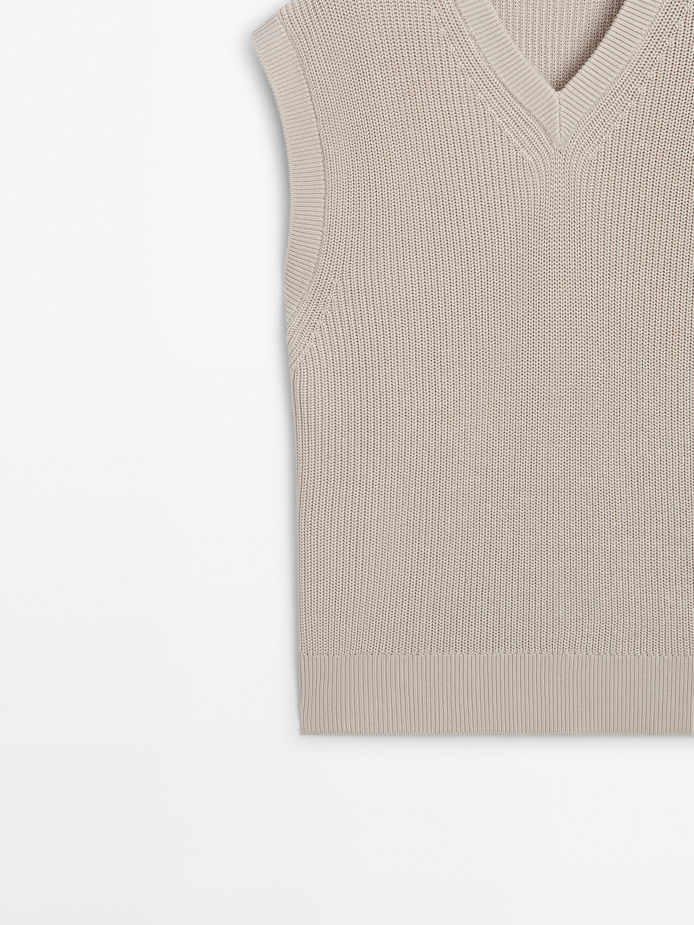 Veste sans manches en maille à col en V et bord-côte