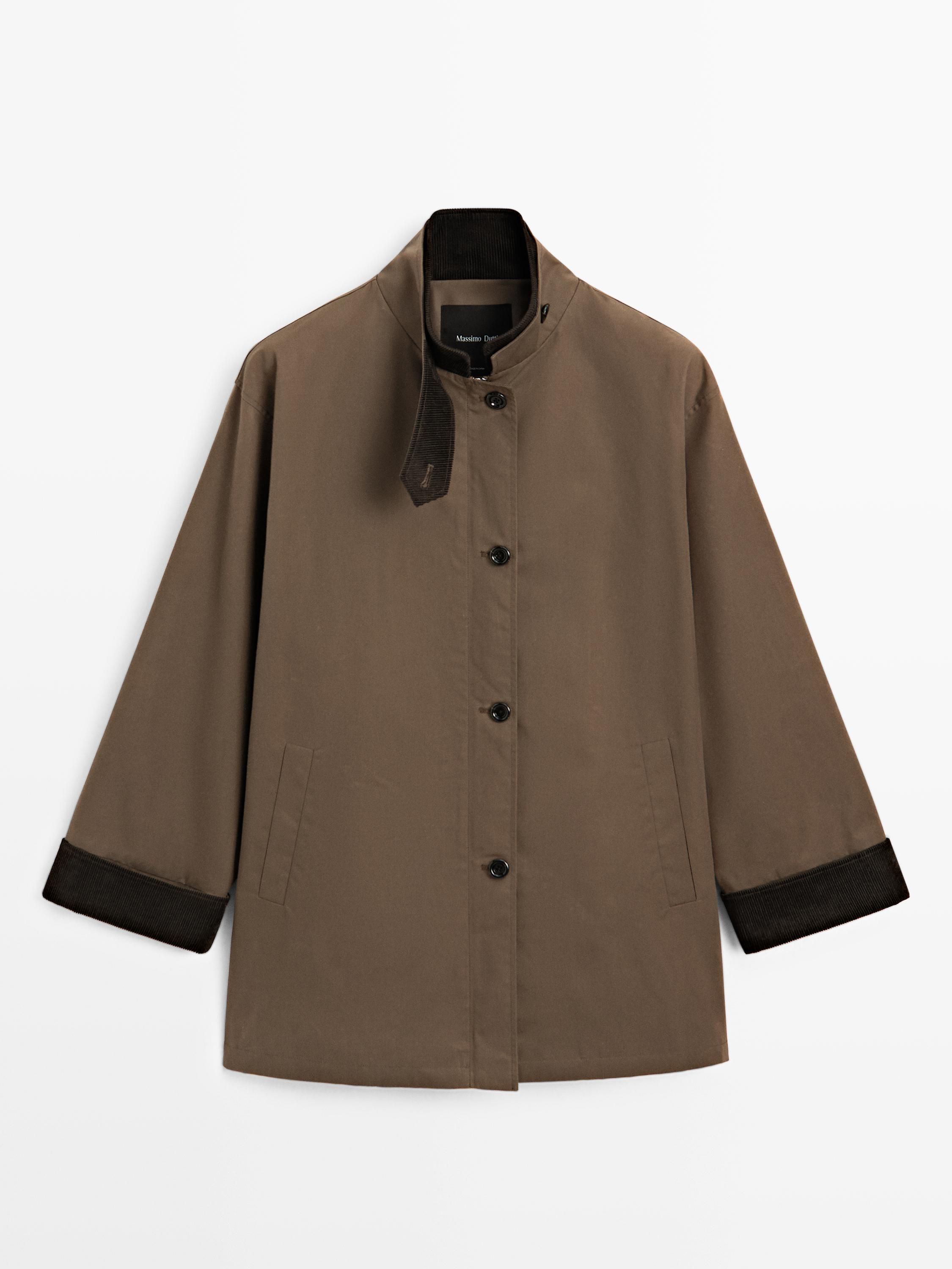 Waxed high neck parka with corduroy detail
